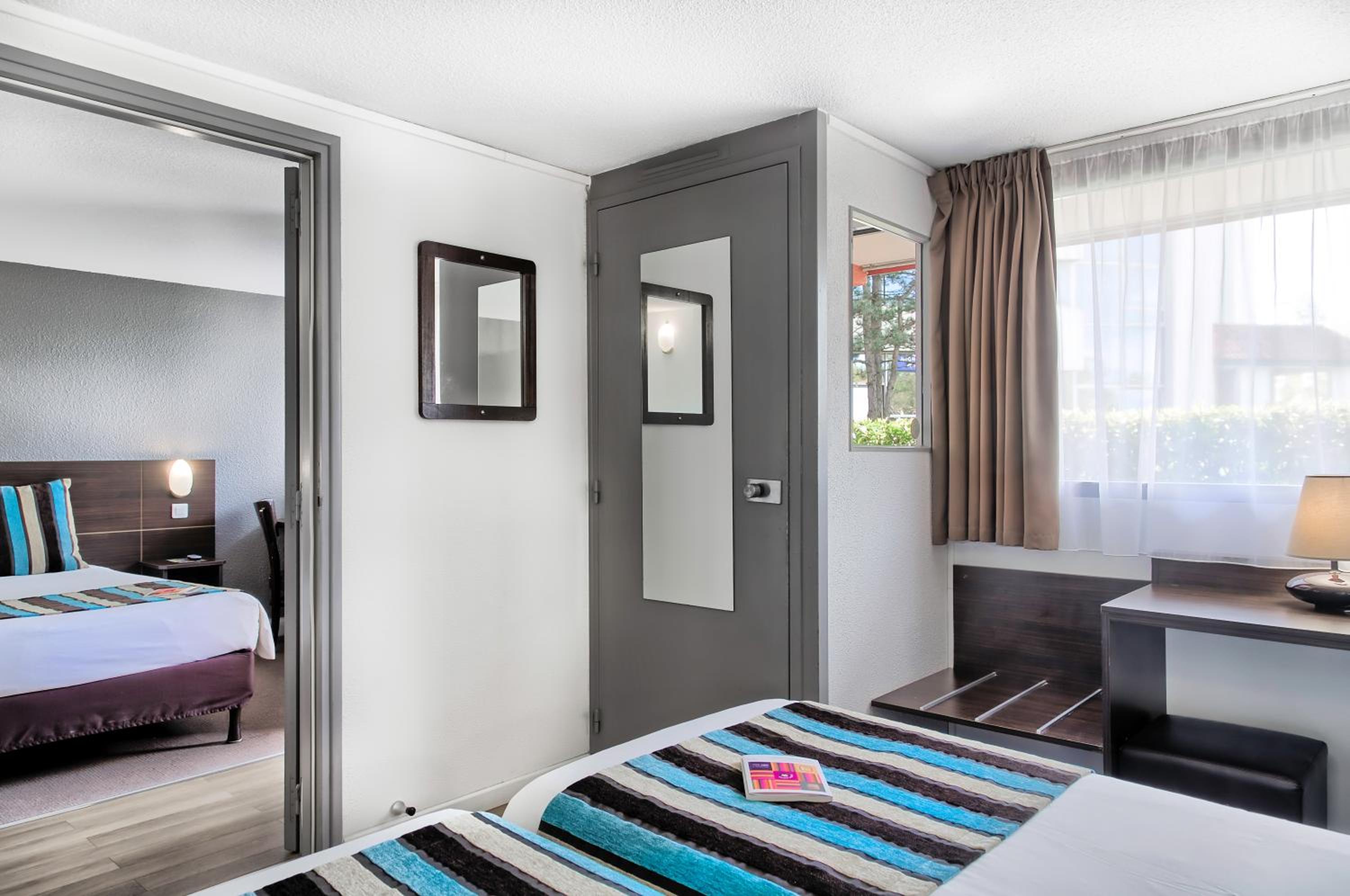 Family Queen Room with Two Single Beds