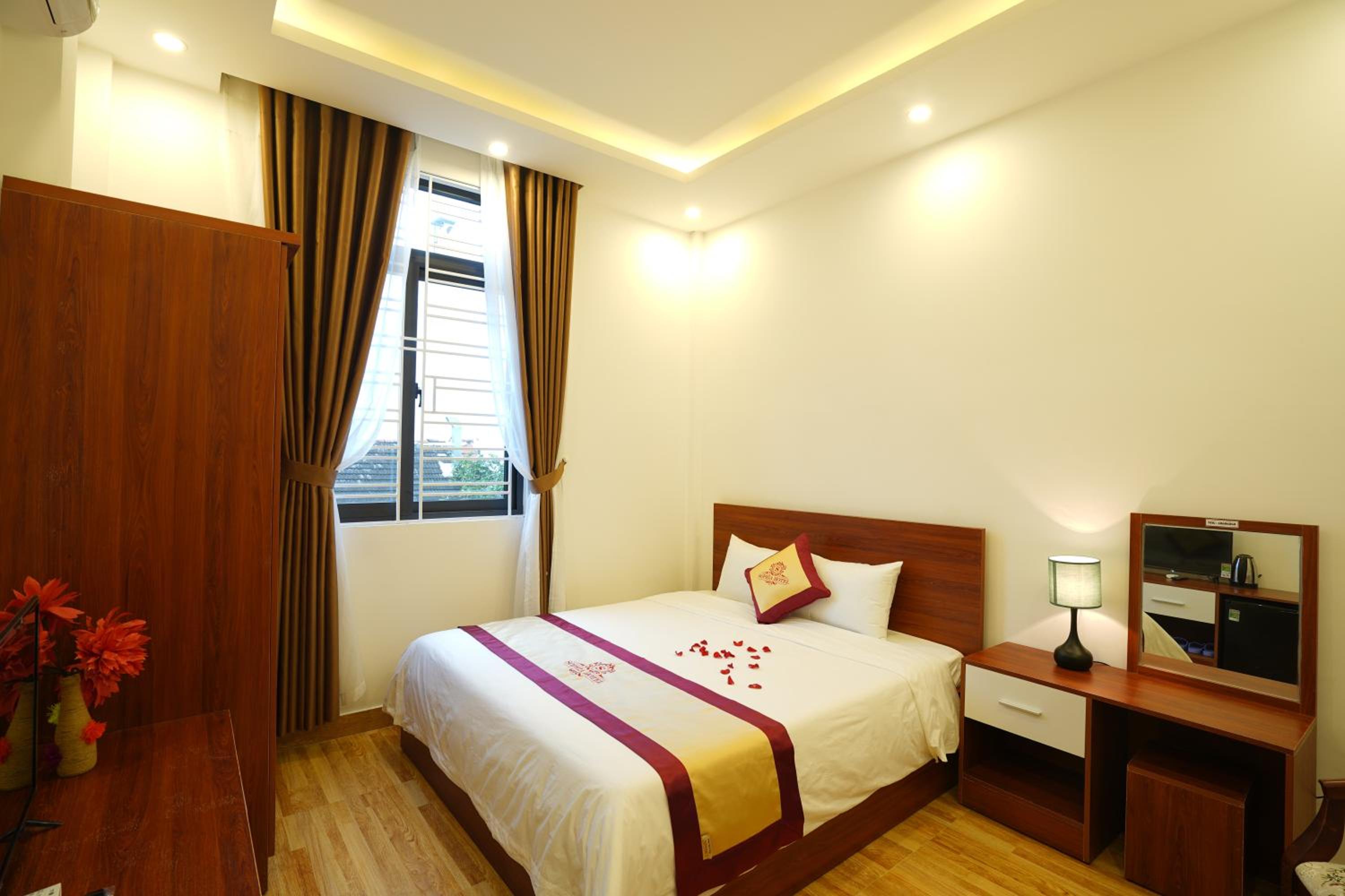Deluxe Room - Photo 25