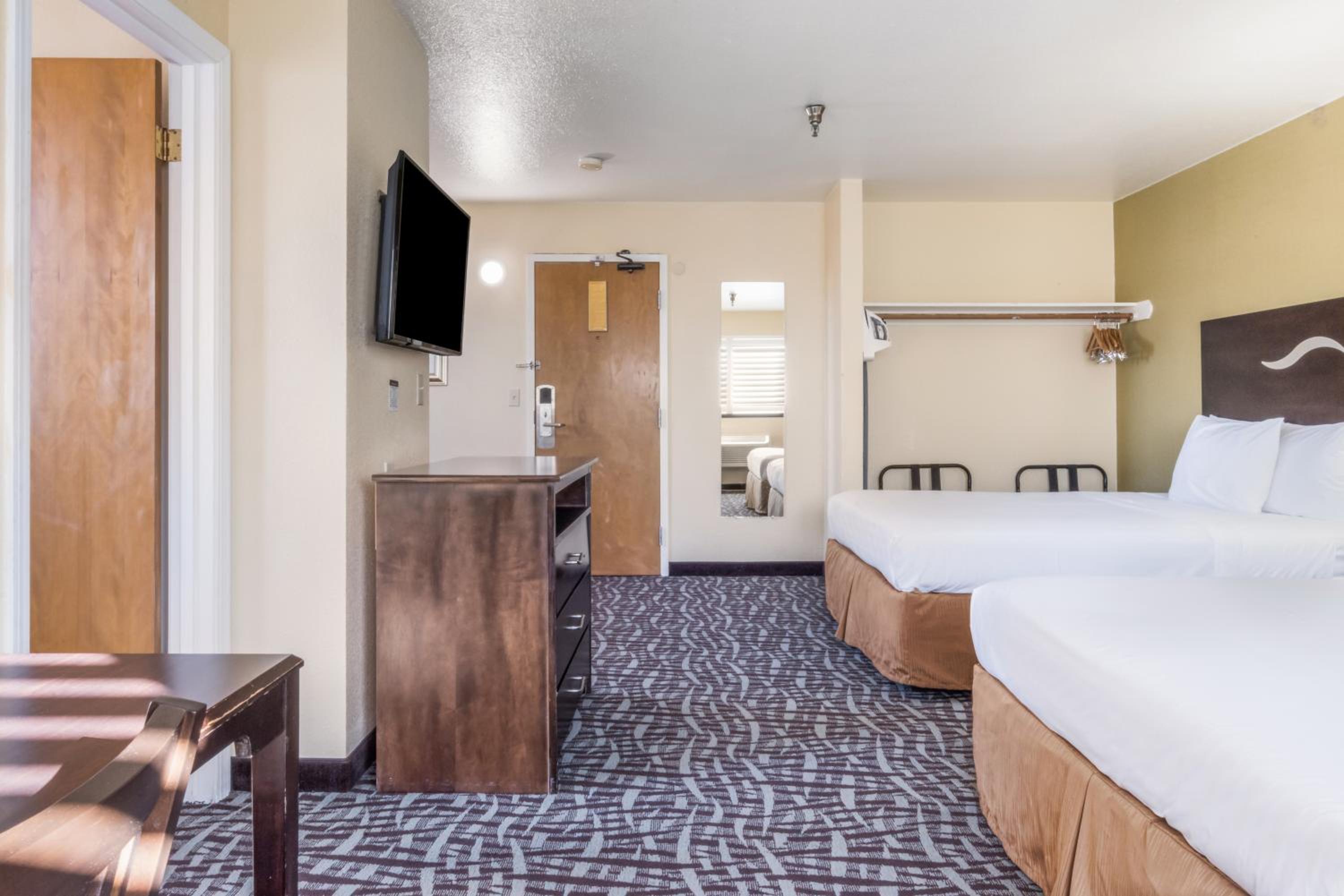 Two Queen Beds Kitchenette Room - Photo 1