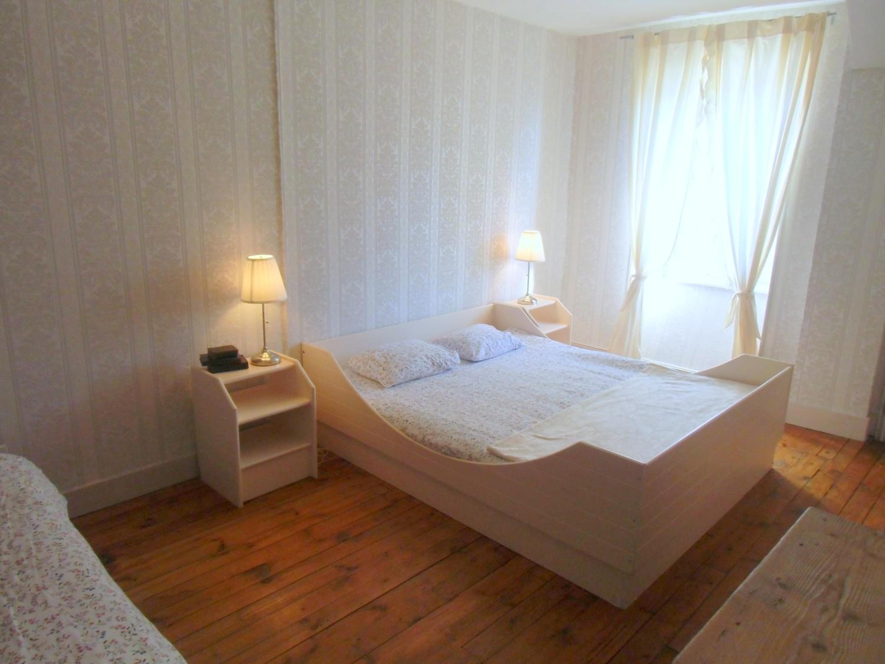 Economy Quadruple Room With Shared Bathroom photo 1