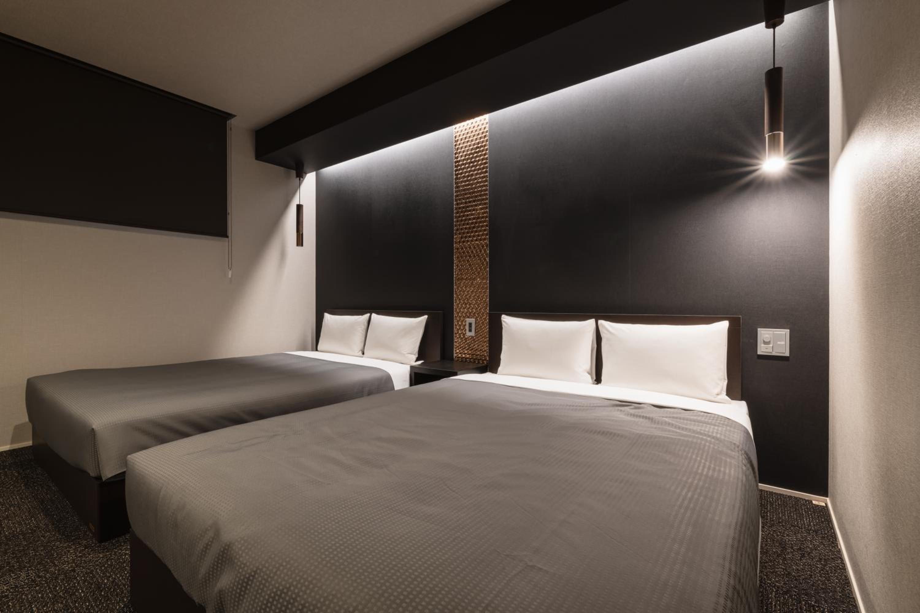 Standard Twin Room - Photo 16