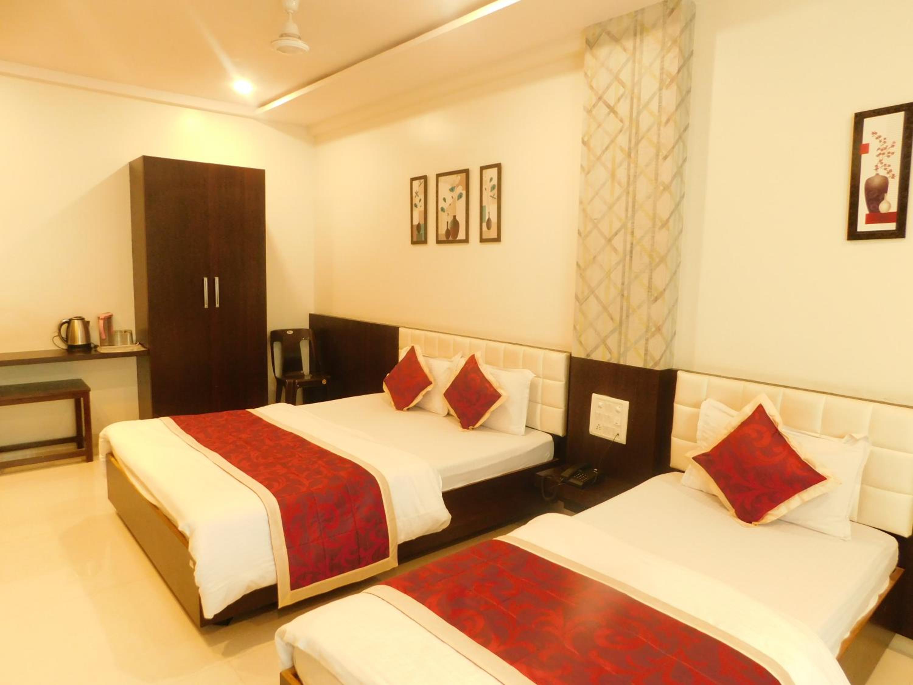 Deluxe Triple Room - Photo 20