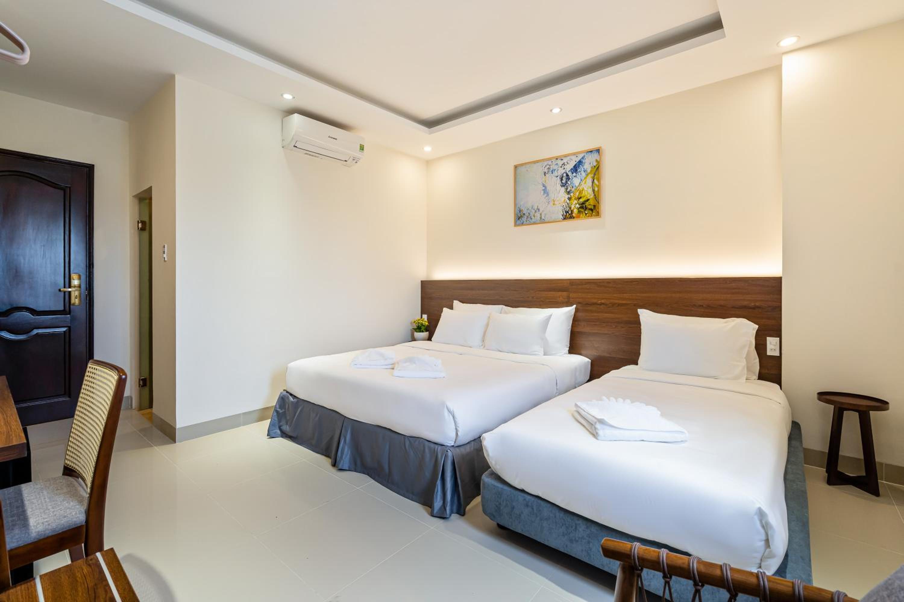 Deluxe Triple Room - Photo 9