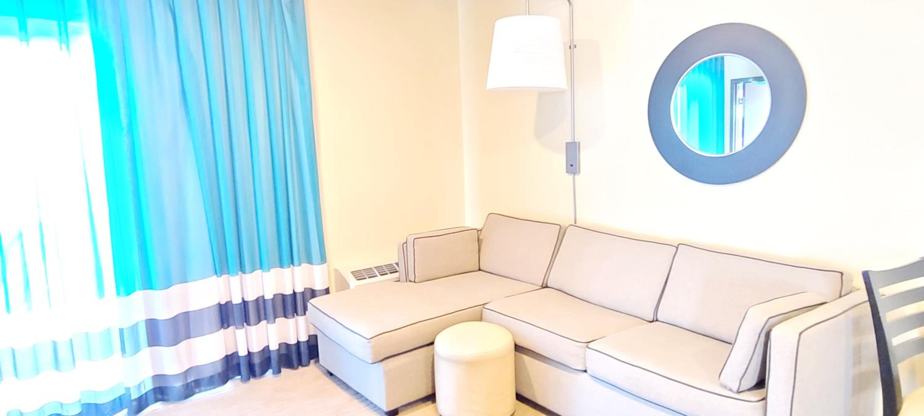 Queen Suite with Two Queen Beds and Sofa Bed - Non-Smoking photo 2