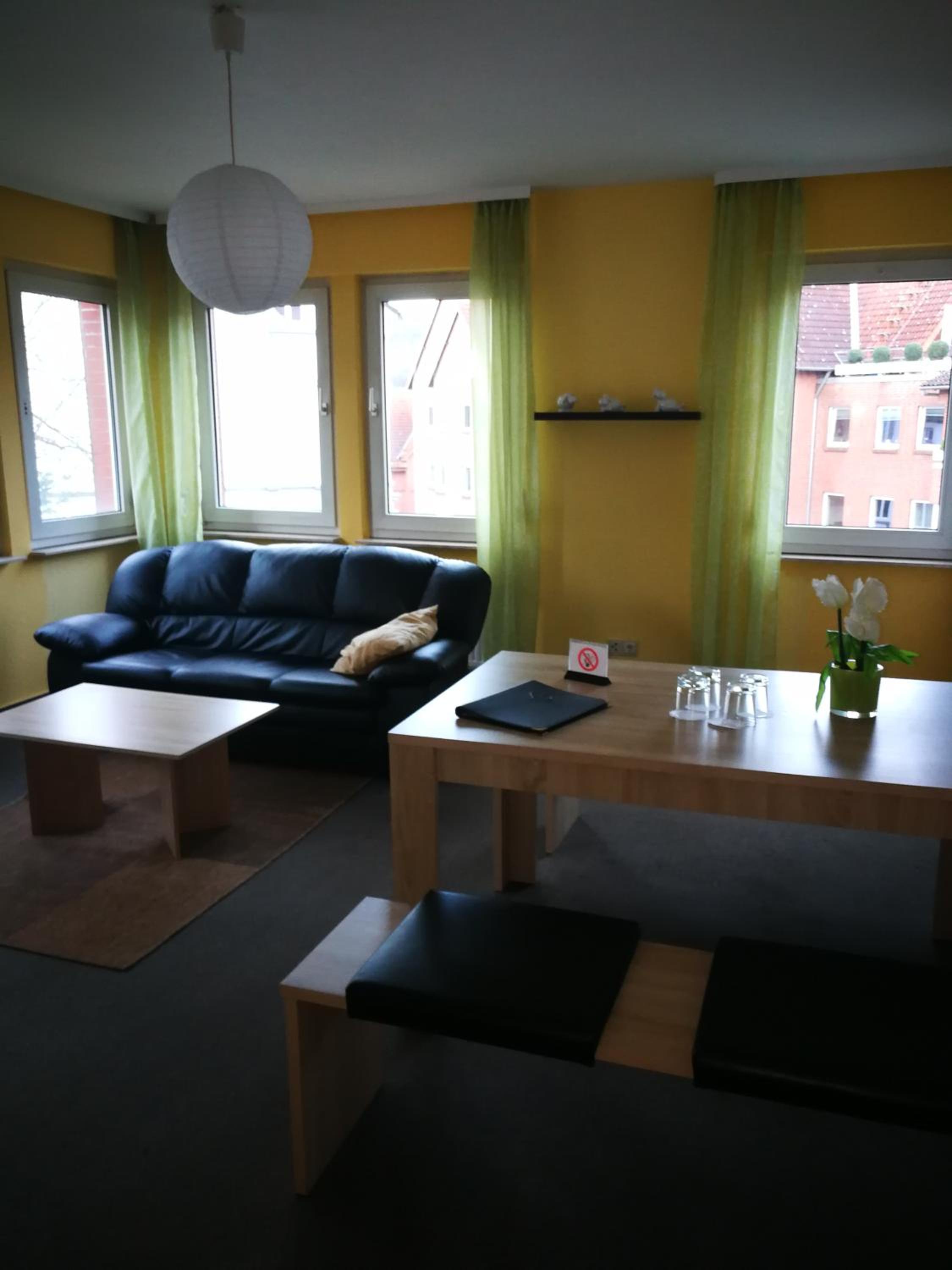 Three-Bedroom Apartment - Photo 2