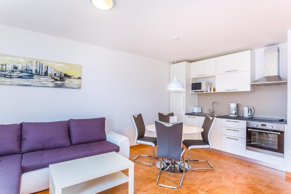 Three-Bedroom Apartment photo 2