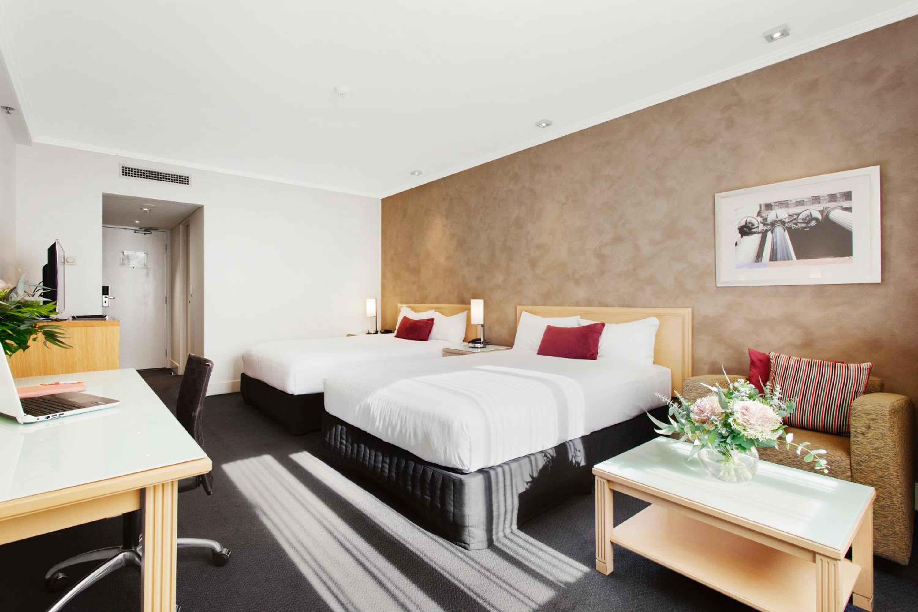 Premium Queen Room with Two Queen Beds - Photo 1