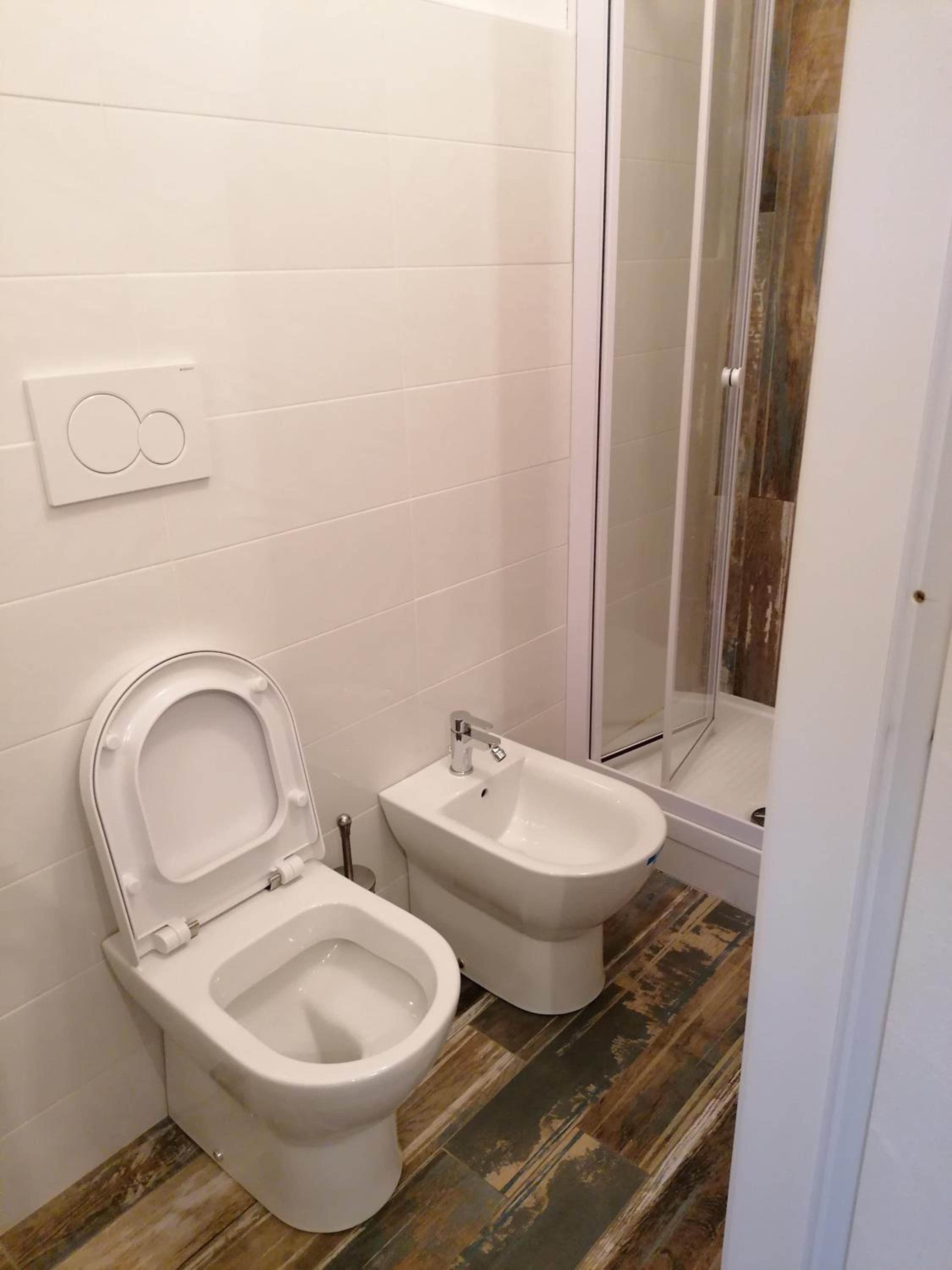 Deluxe Quadruple Room - Photo 13