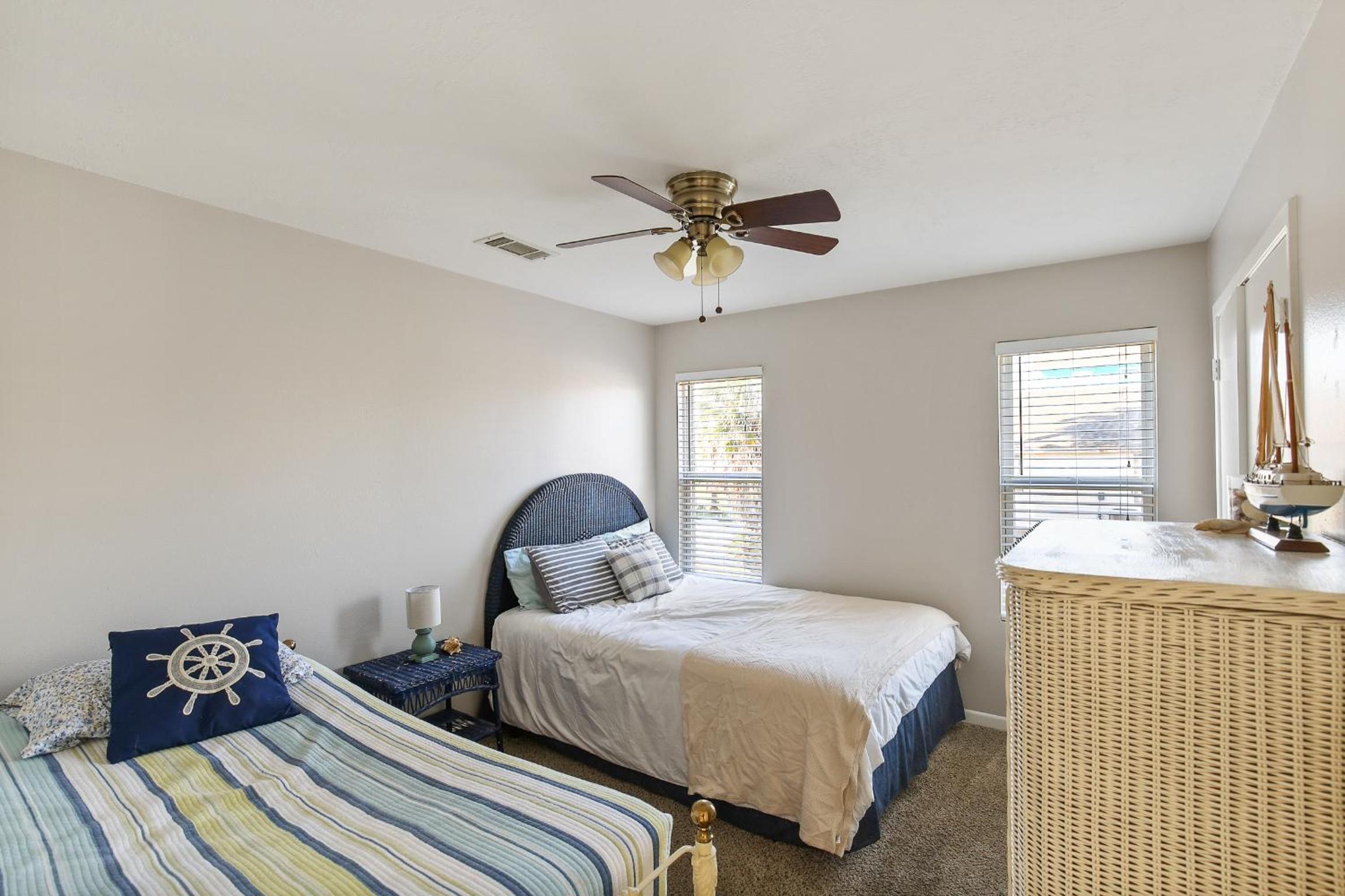Three-Bedroom House - Photo 57