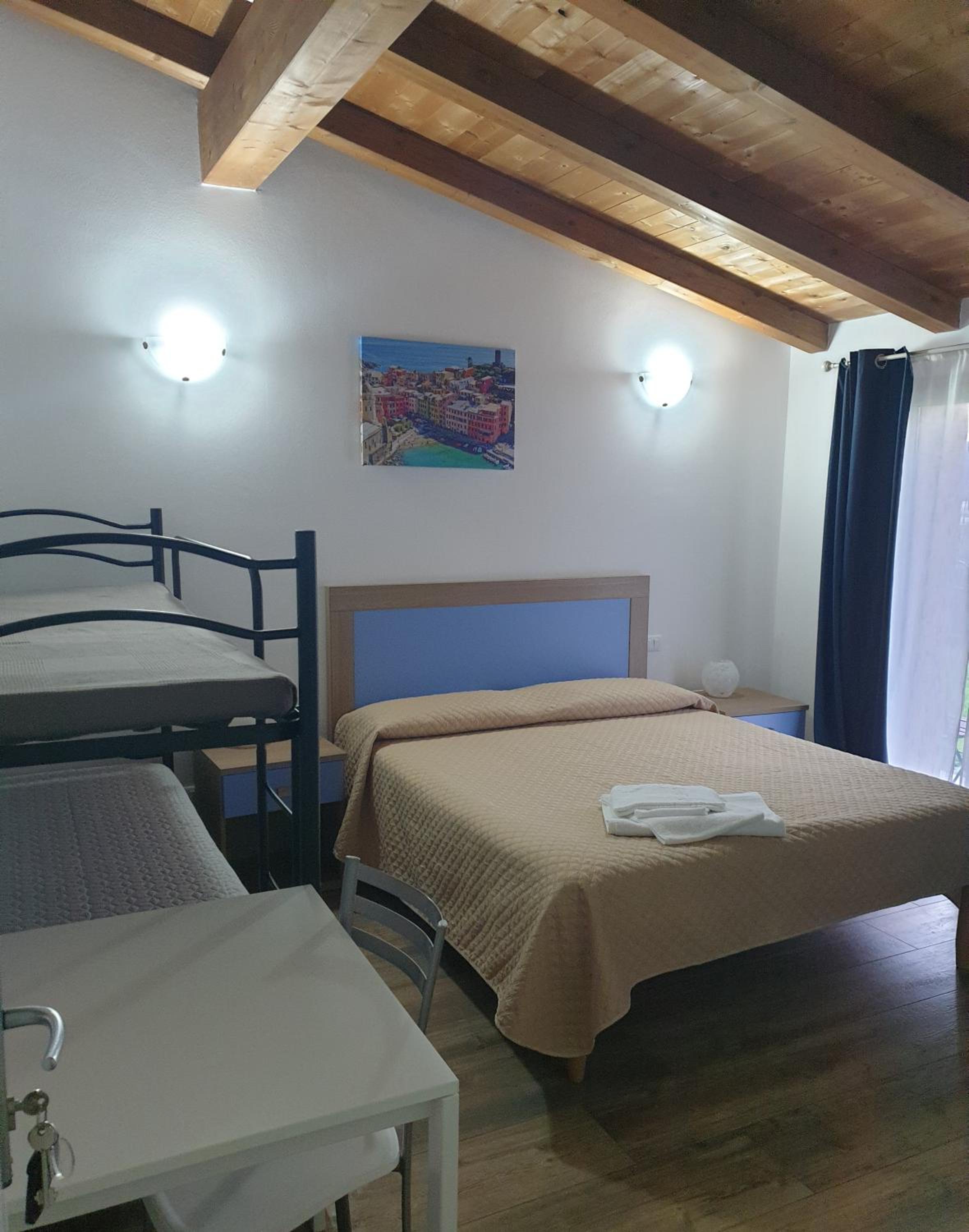 Quadruple Room - Photo 1