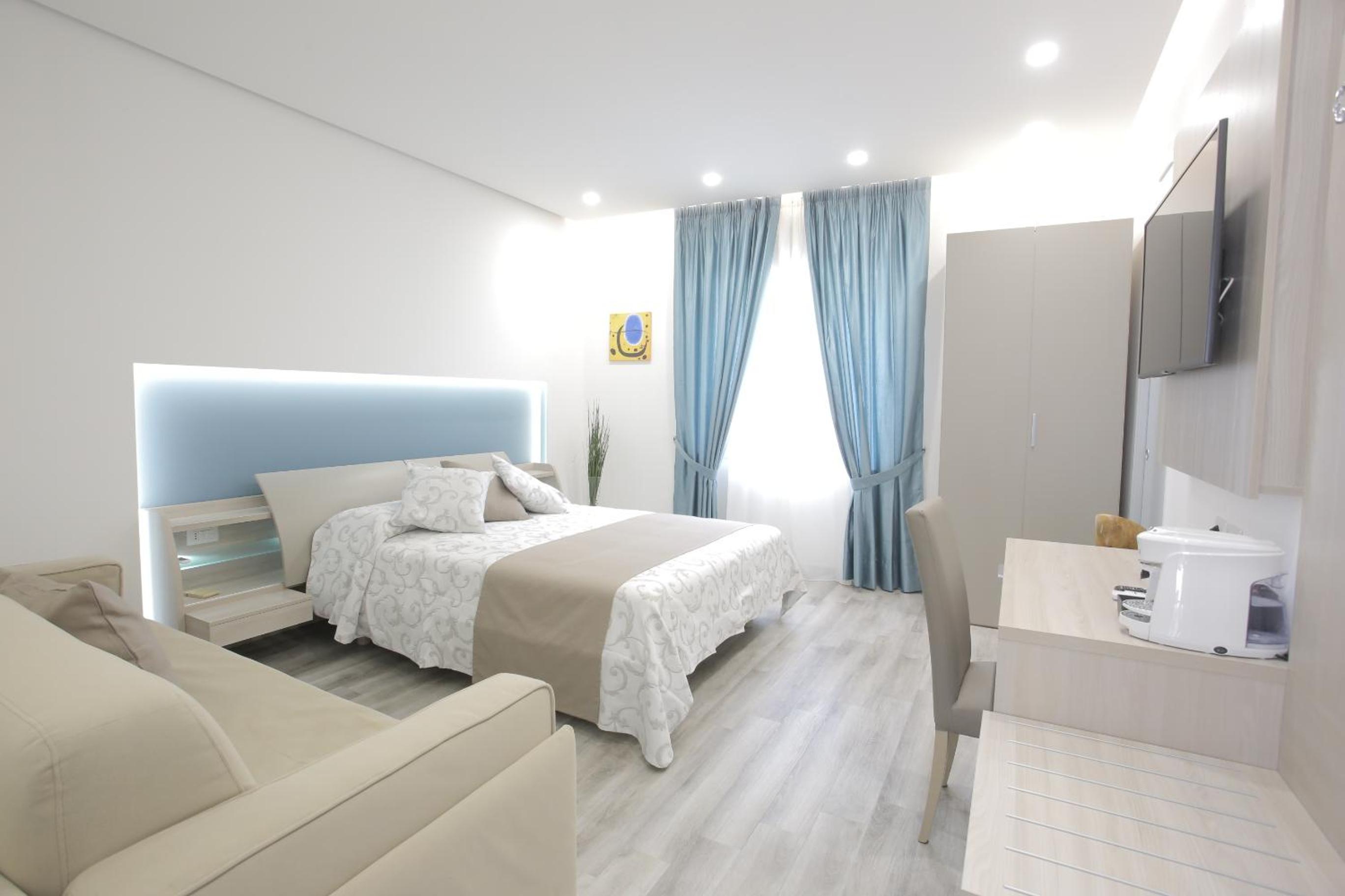 Deluxe Quadruple Room - Photo 1
