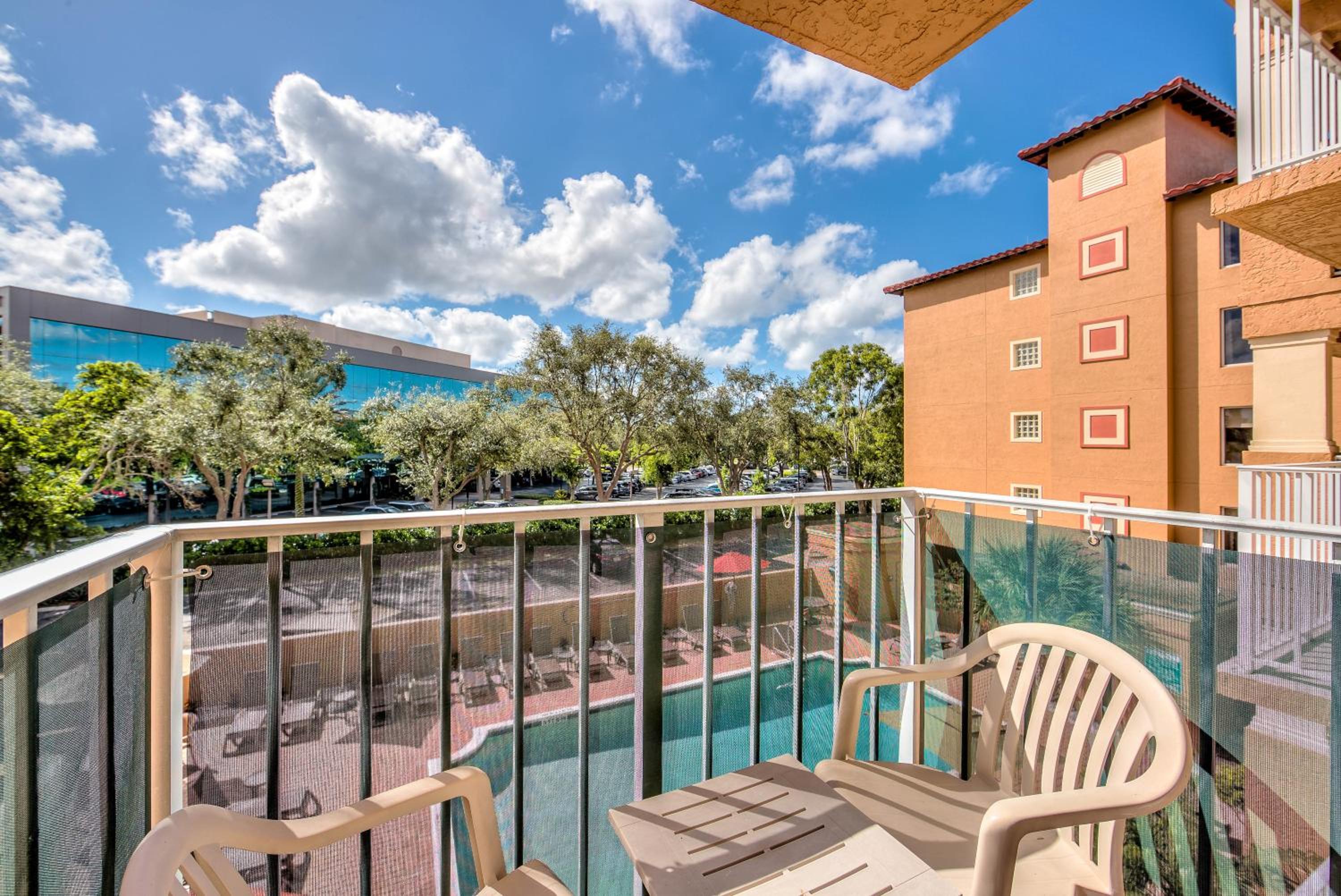 Double Room with Two Double Beds, Balcony and Pool View - Photo 2