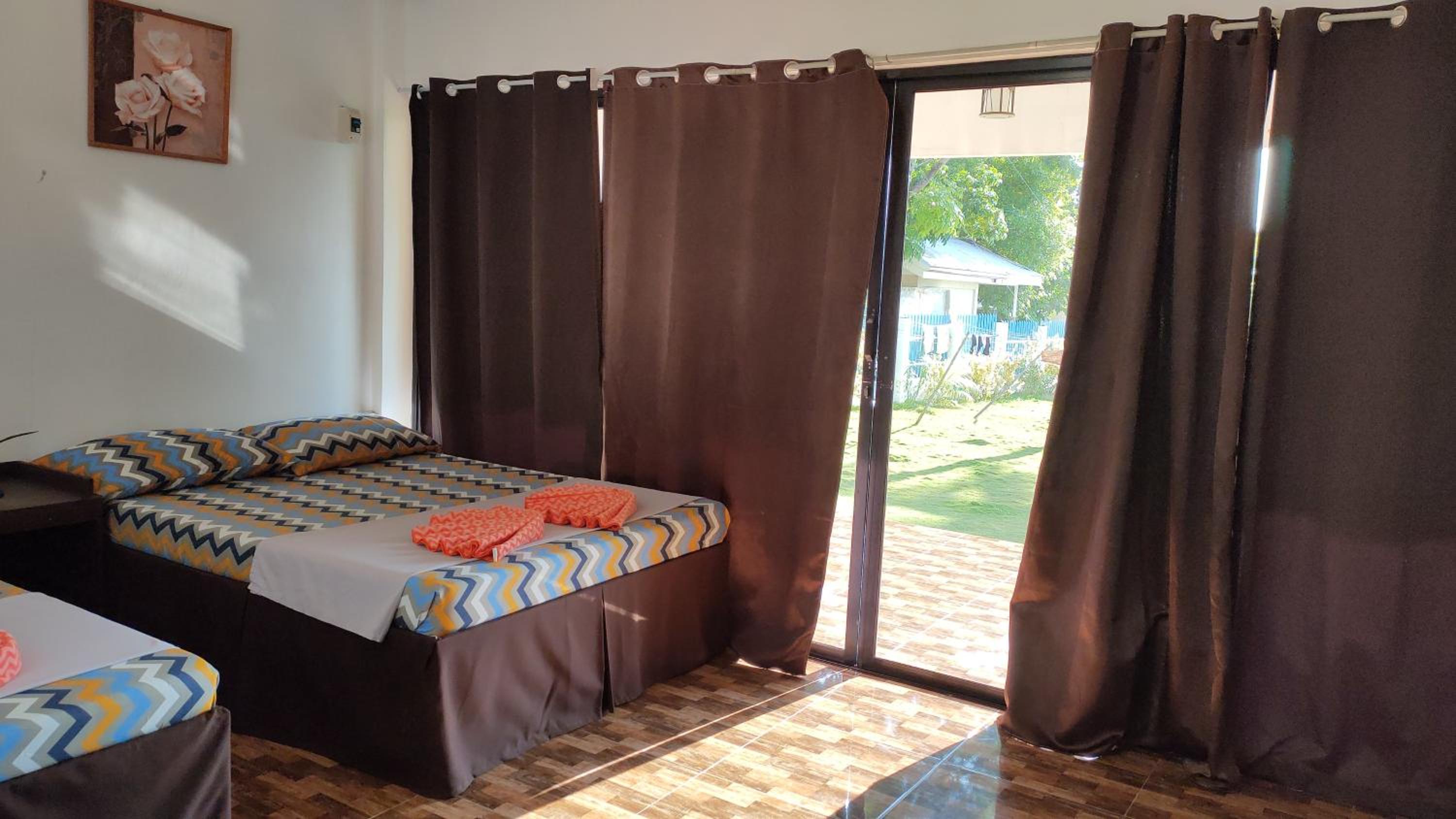 Family Room with Balcony - Photo 1