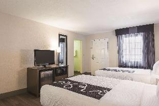 Room with Two Double Beds and Bath Tub - Mobility/Hearing Access - Non-Smoking - Photo 1