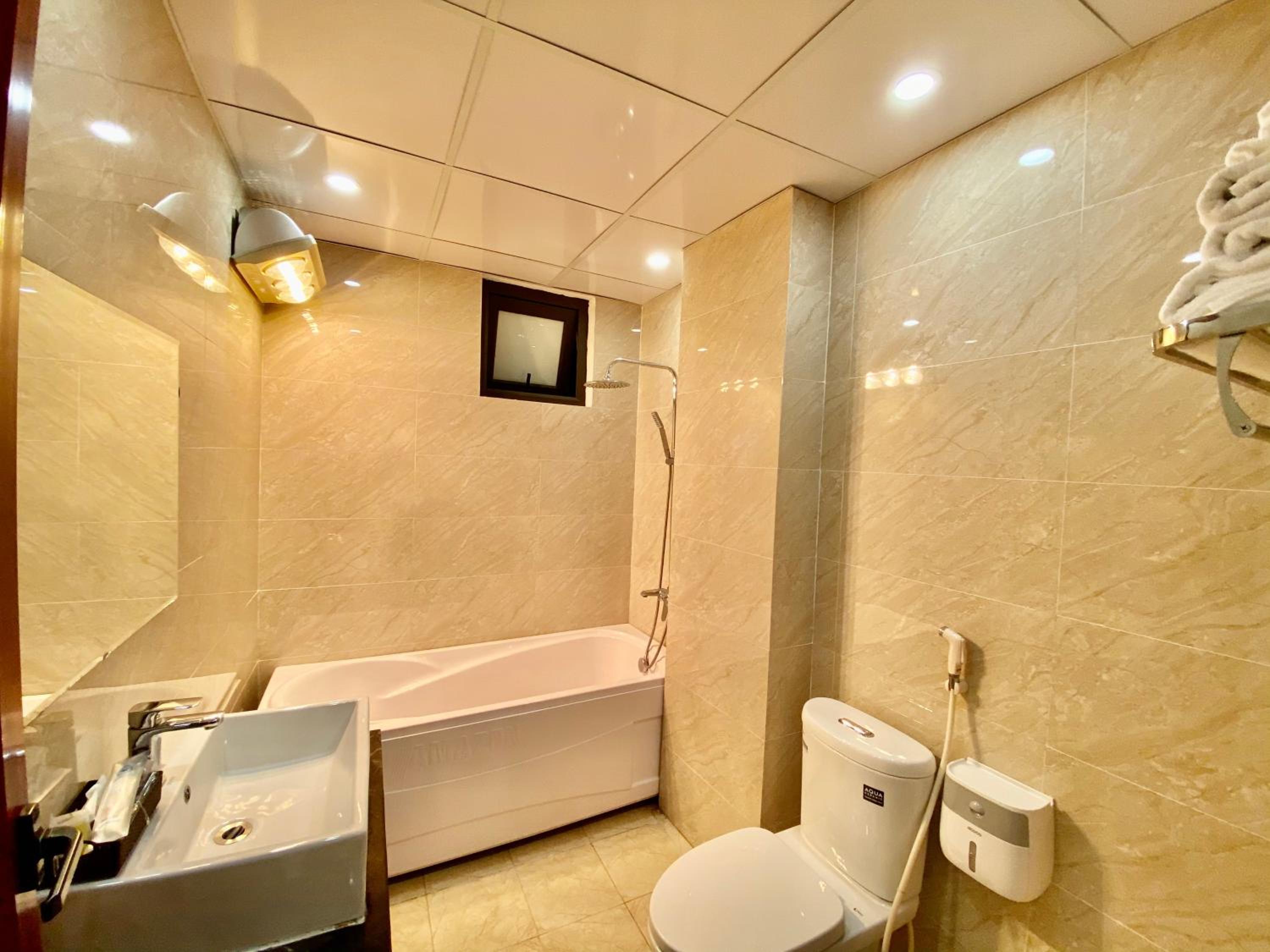 Deluxe Quadruple Room - Photo 7