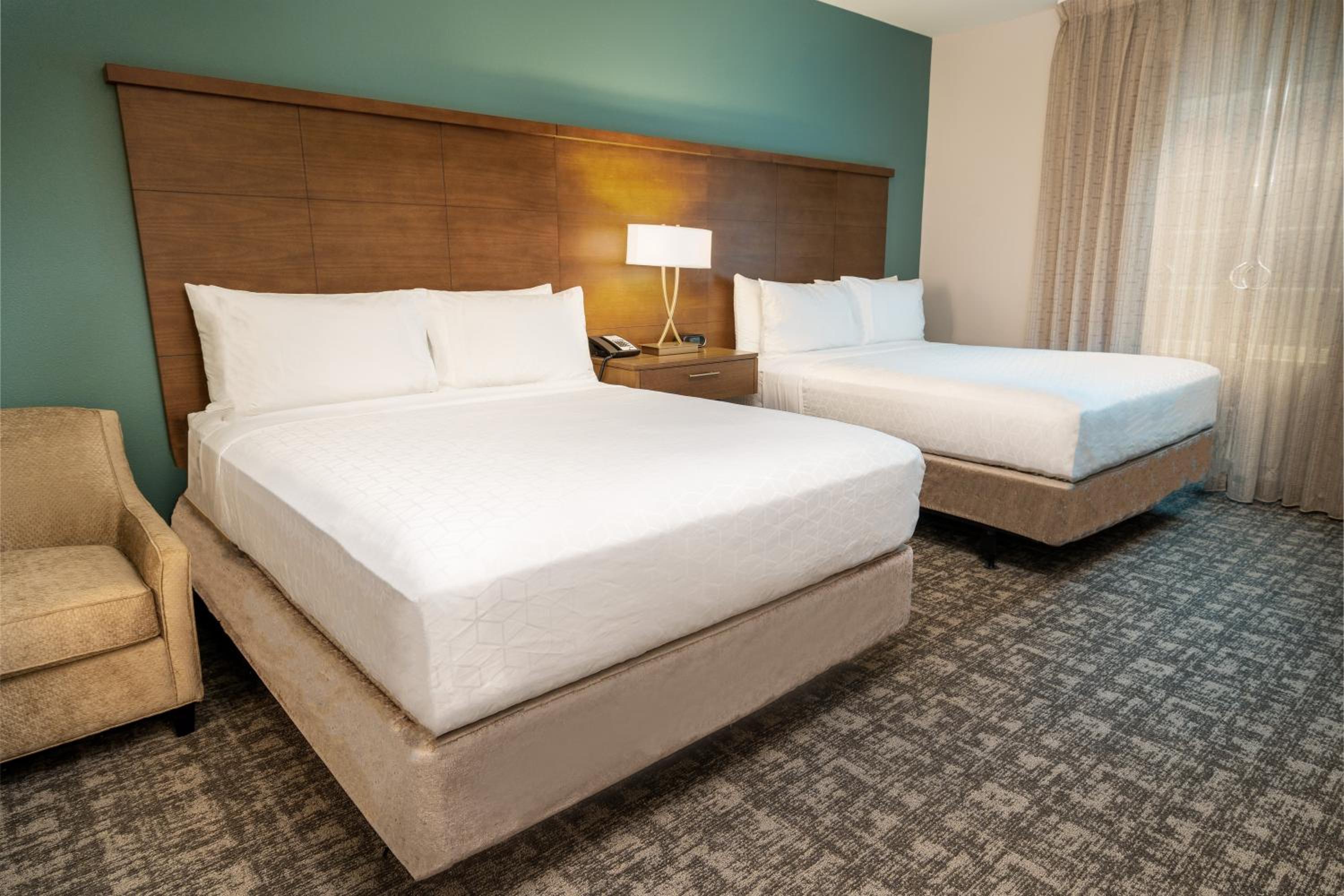 Queen Room with Two Queen Beds - Hearing Accessible - Photo 1