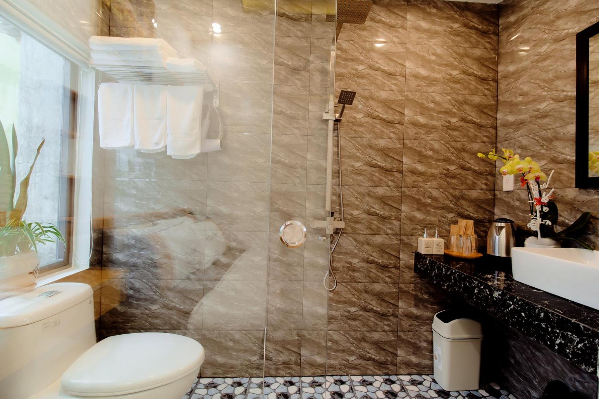 Deluxe Triple Room - Photo 7
