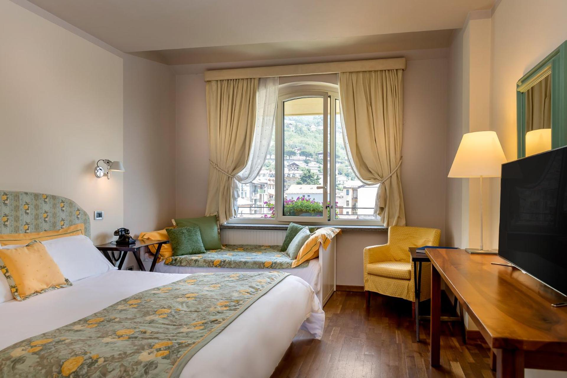 Triple room with extra bed and View - Photo 1