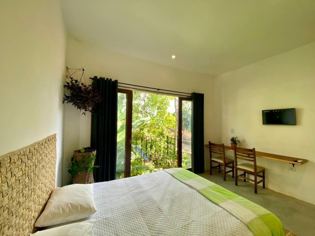 Deluxe Queen Suite - Photo 3
