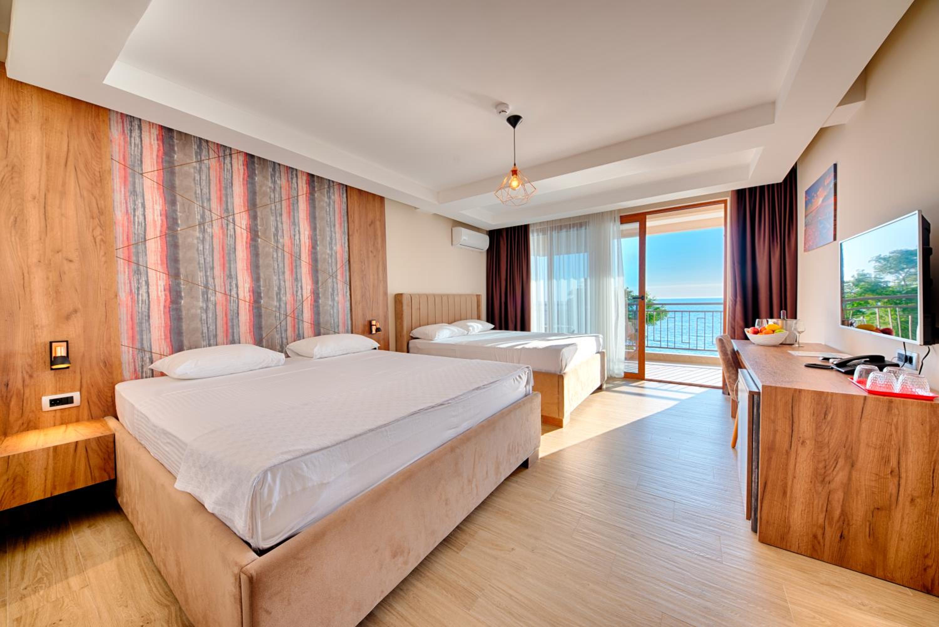 Deluxe Family Room with Terrace and Sea View - Photo 1
