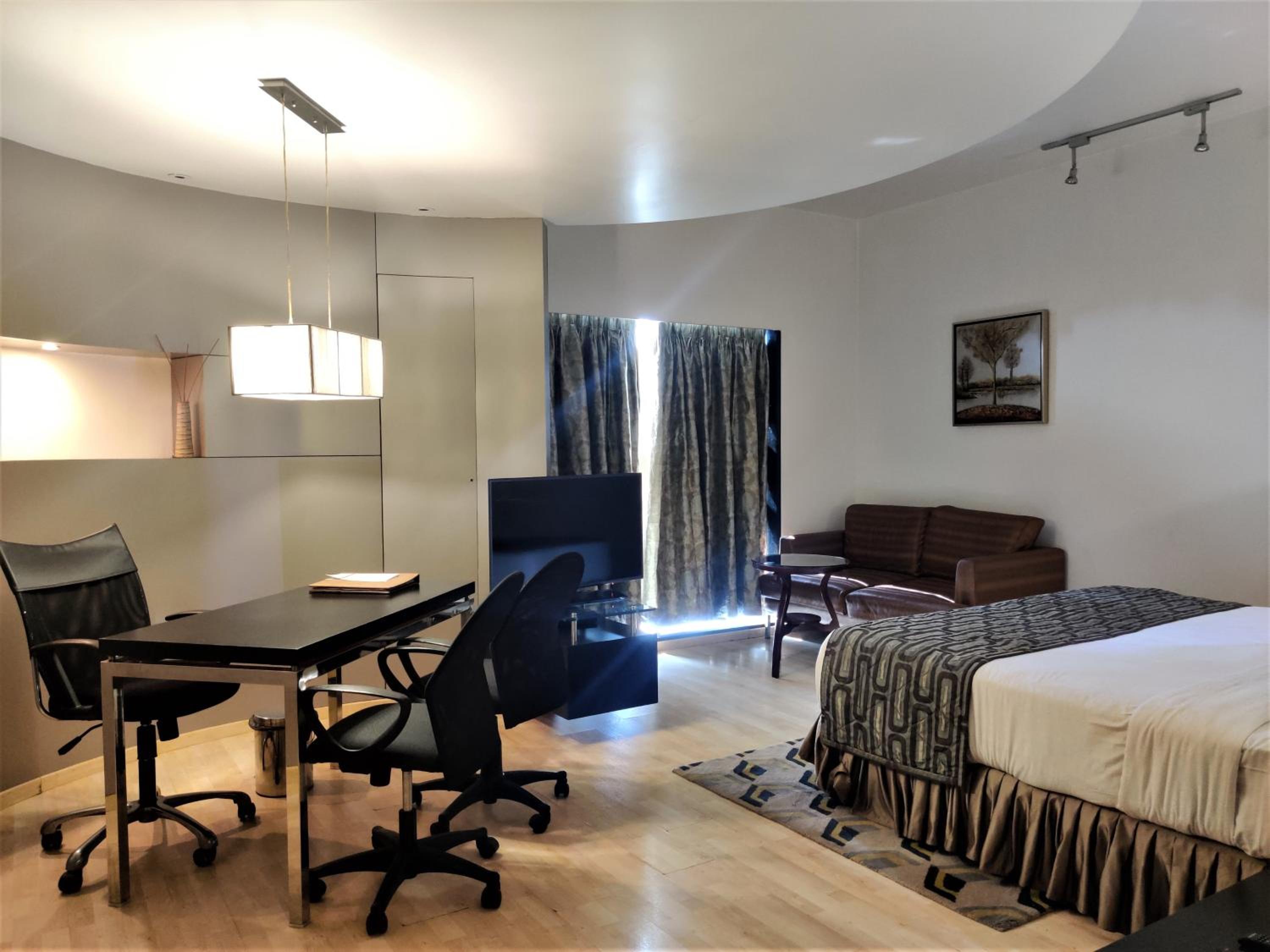 Deluxe Room - Photo 1