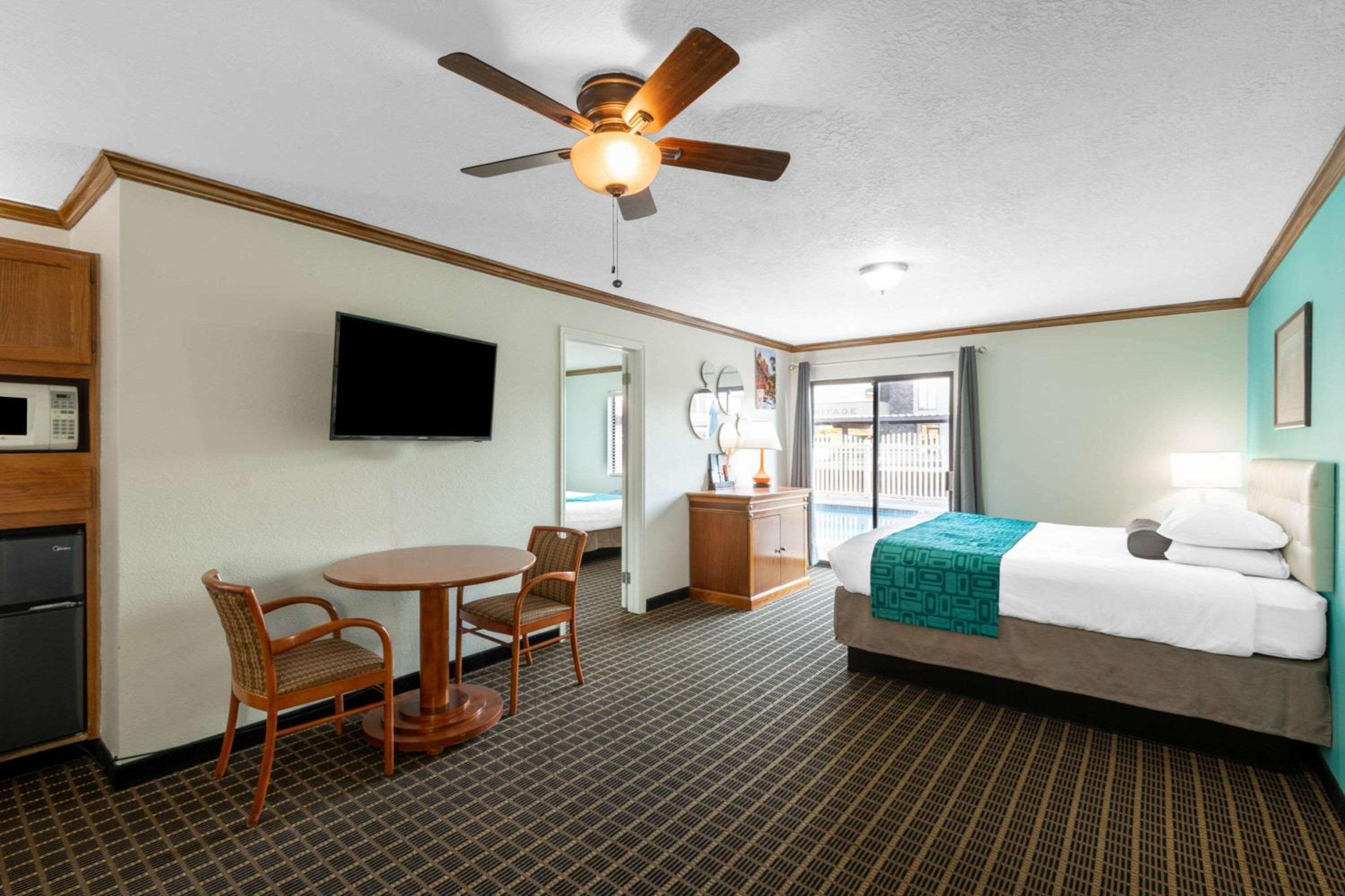 One Bedroom Suite with 2 Queen Beds and 1 King Bed, Non-Smoking  - Photo 1
