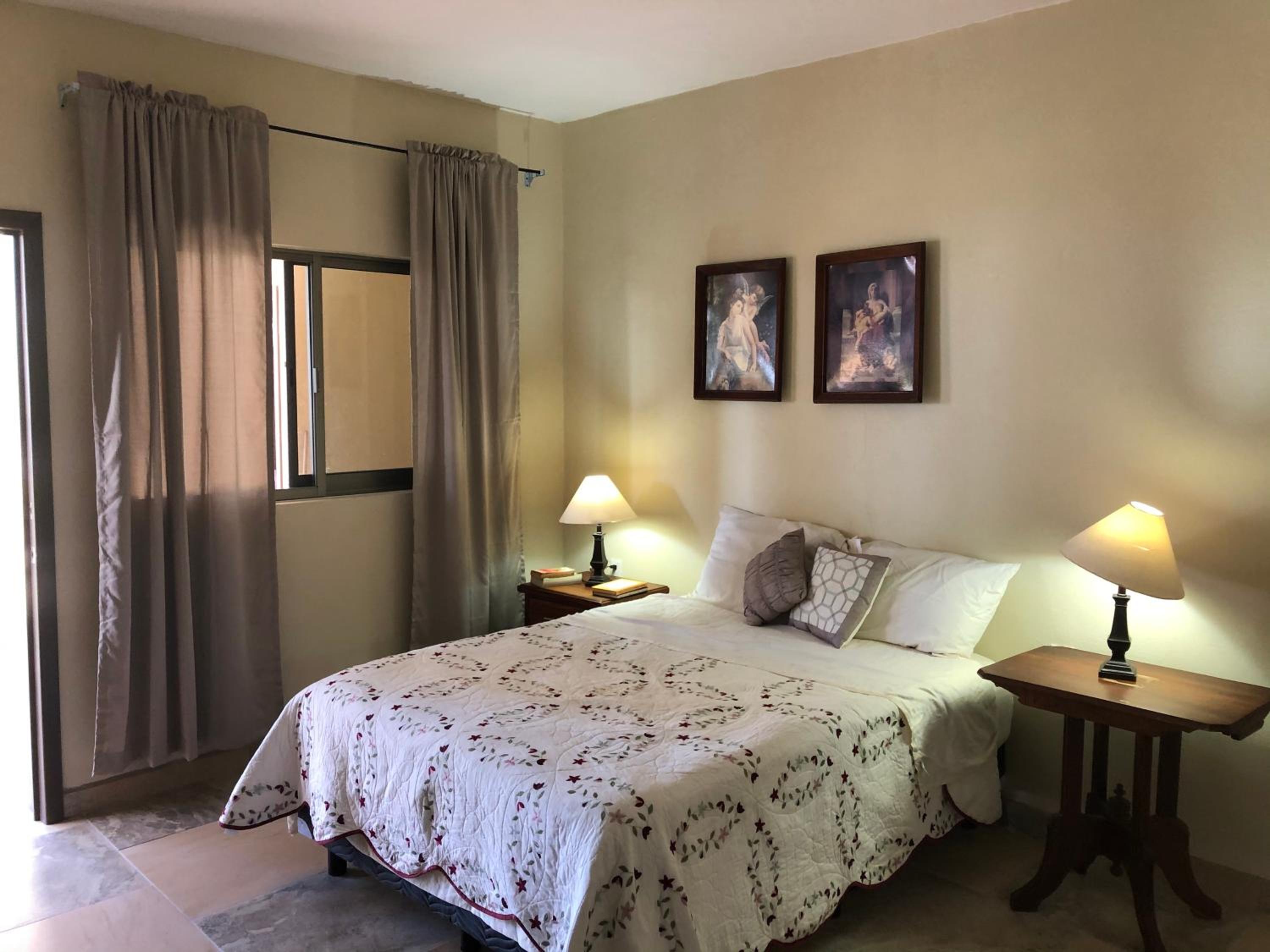 Deluxe Queen Room with Two Queen Beds - Photo 1