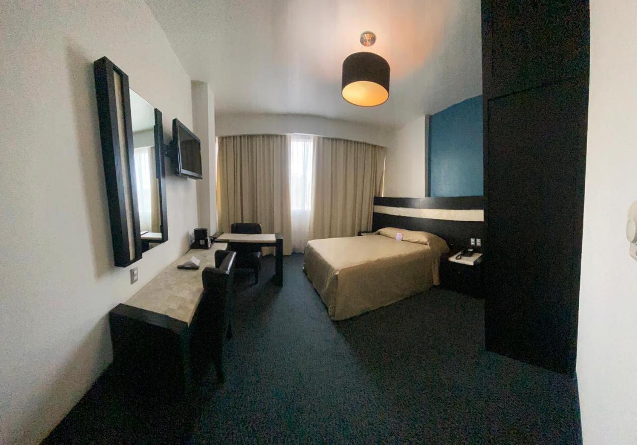Deluxe Queen Room - Photo 1