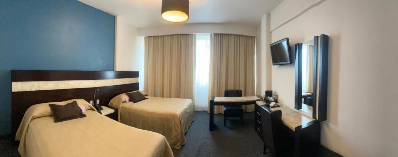 Deluxe Quadruple Room - Photo 1