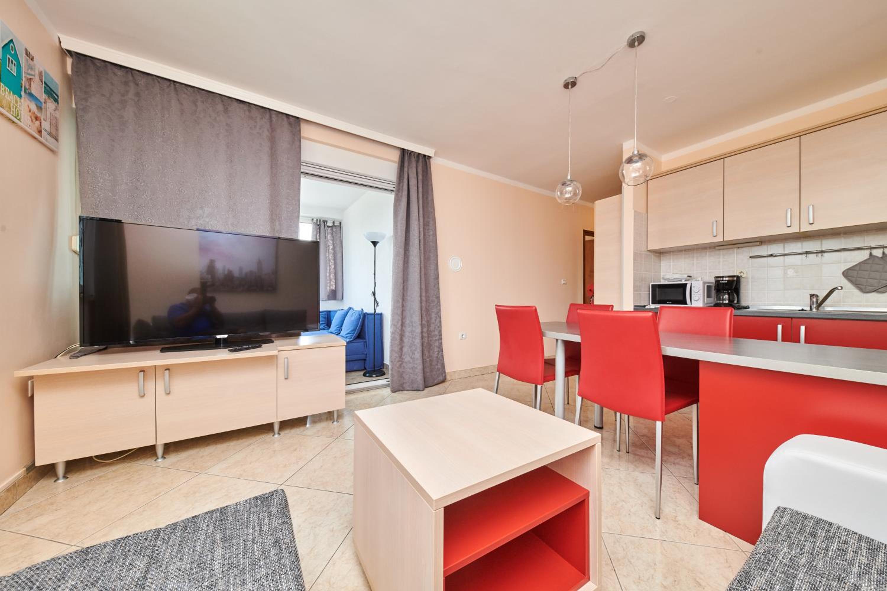 One-Bedroom Apartment with Balcony and Sea View