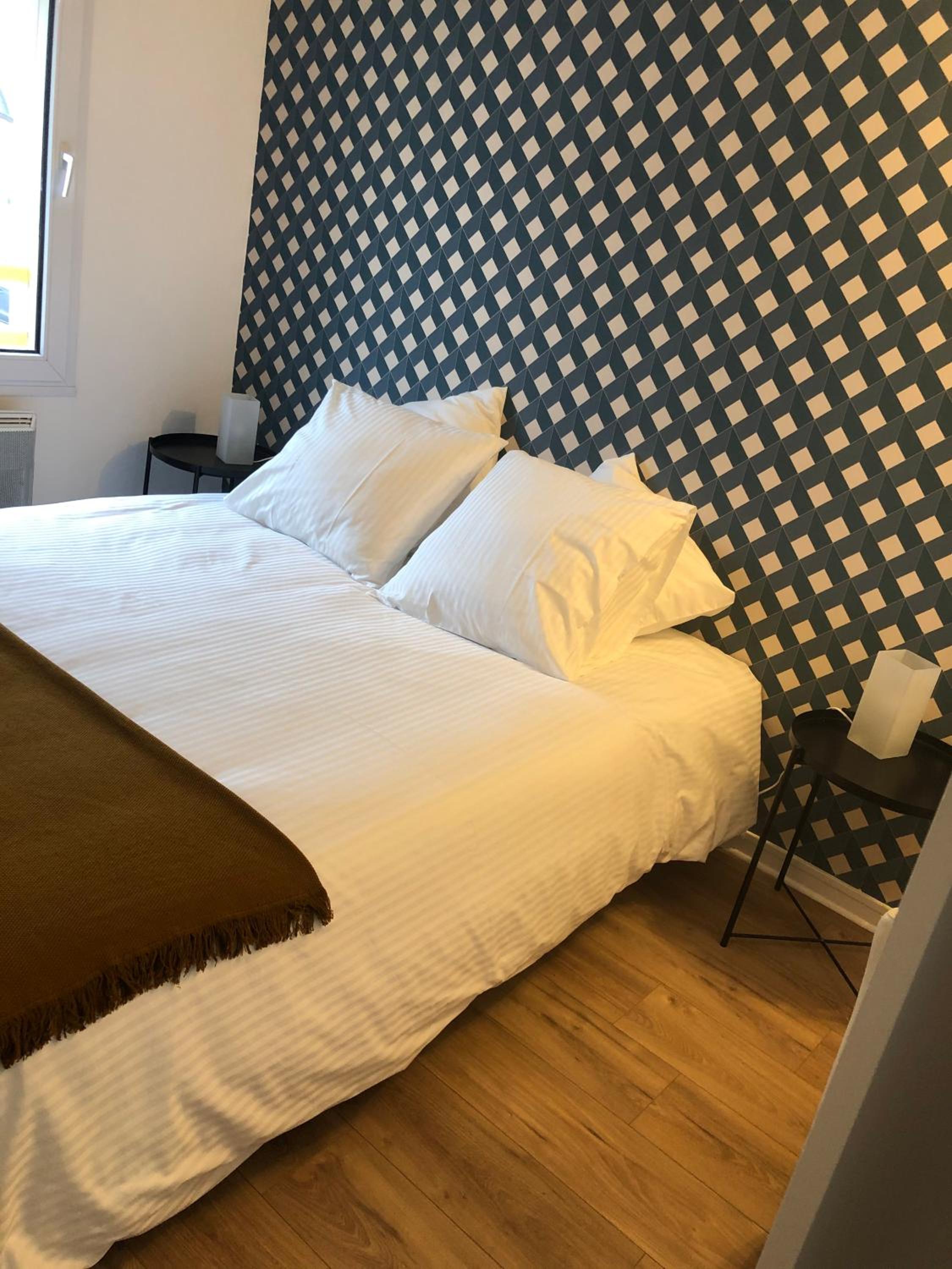 Three-Bedroom Apartment - Photo 10