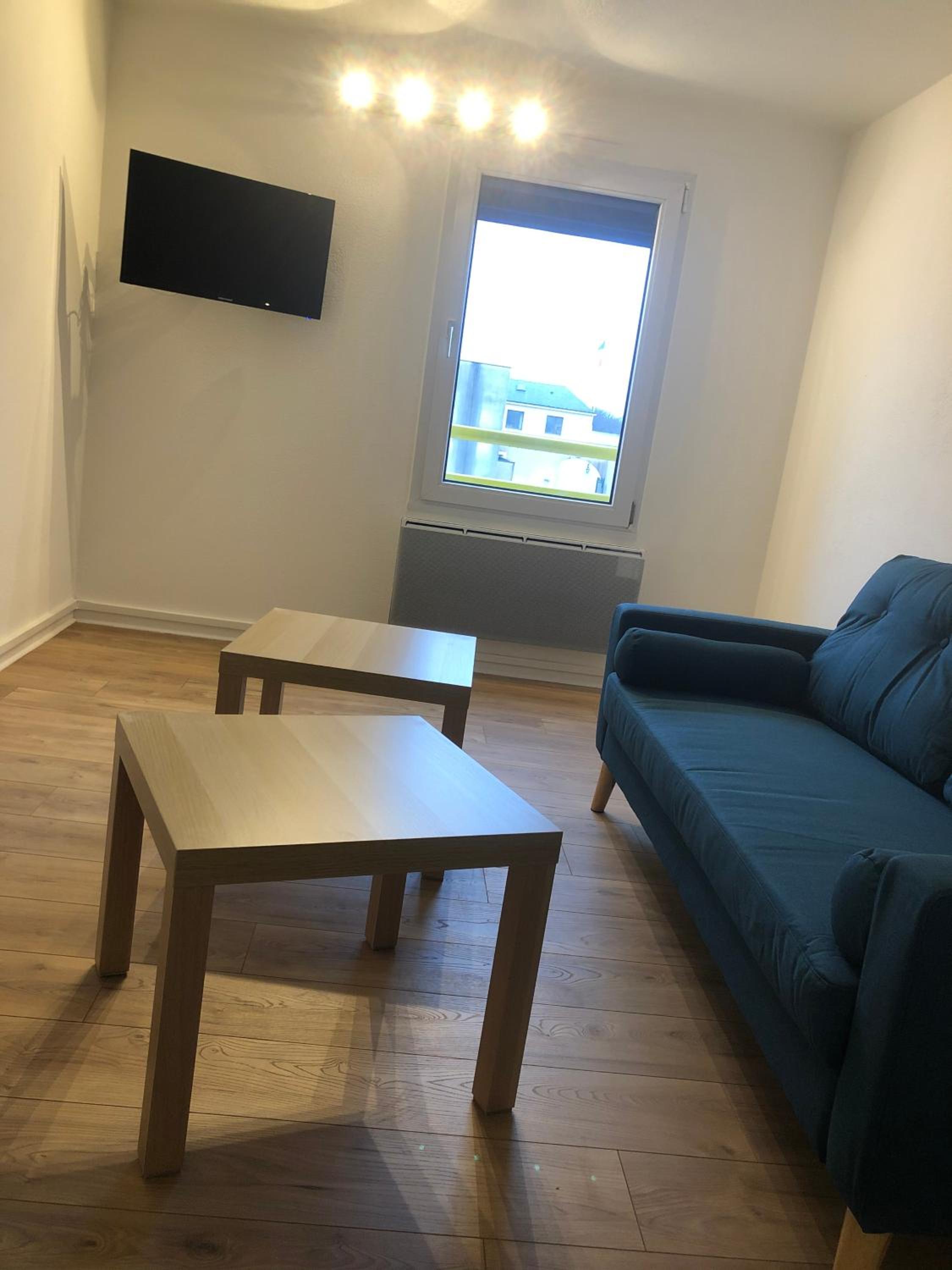 Three-Bedroom Apartment - Photo 6