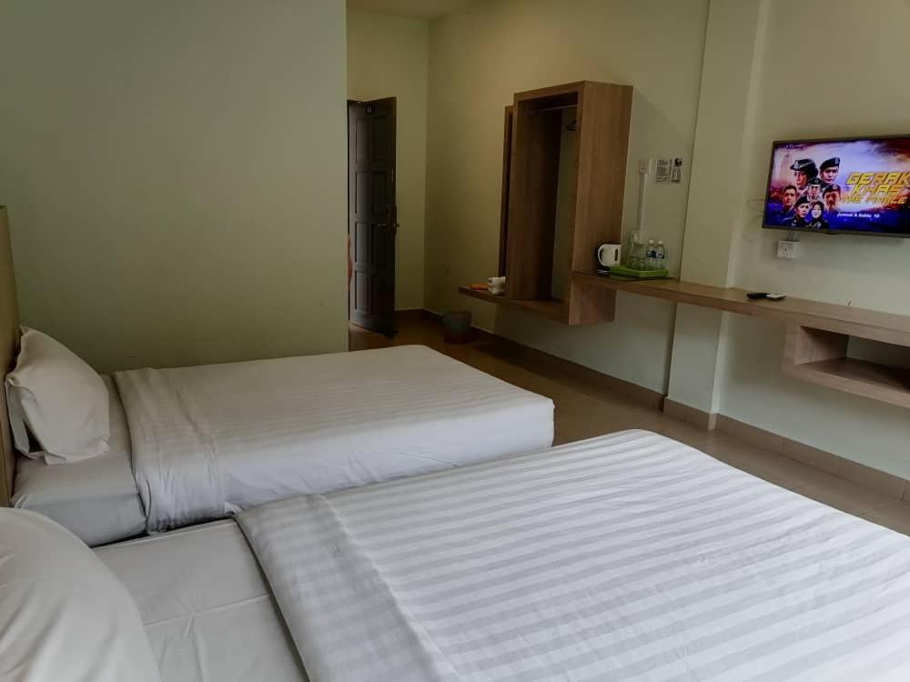 Standard Twin Room - Photo 3