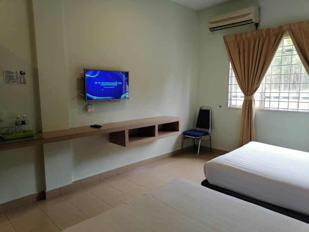 Standard Twin Room - Photo 4