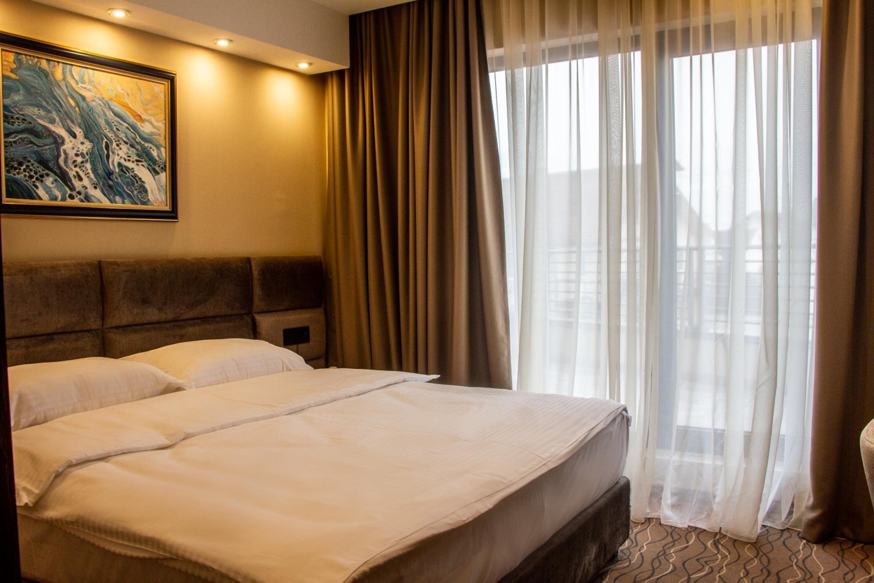 Deluxe Double Room with Balcony - Photo 1