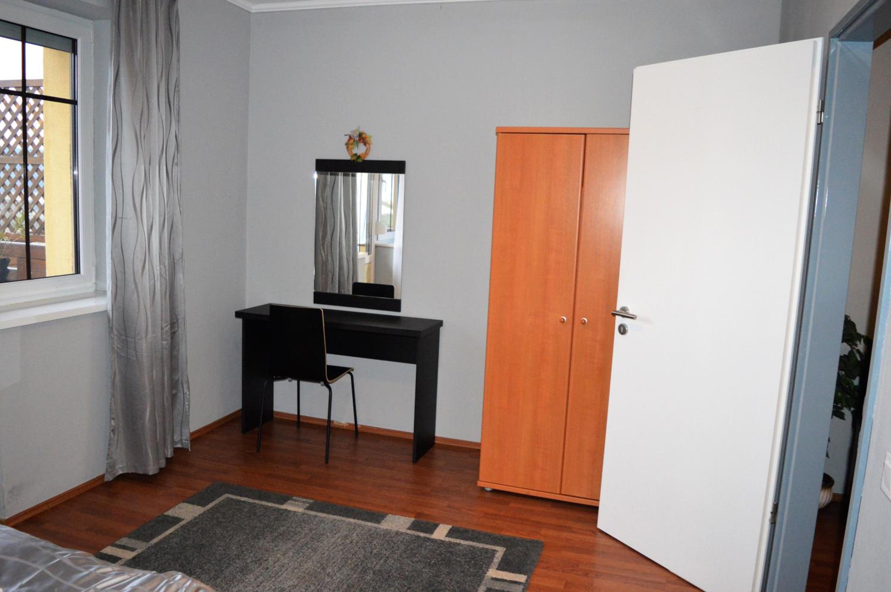 Two-Bedroom Apartment - Photo 16