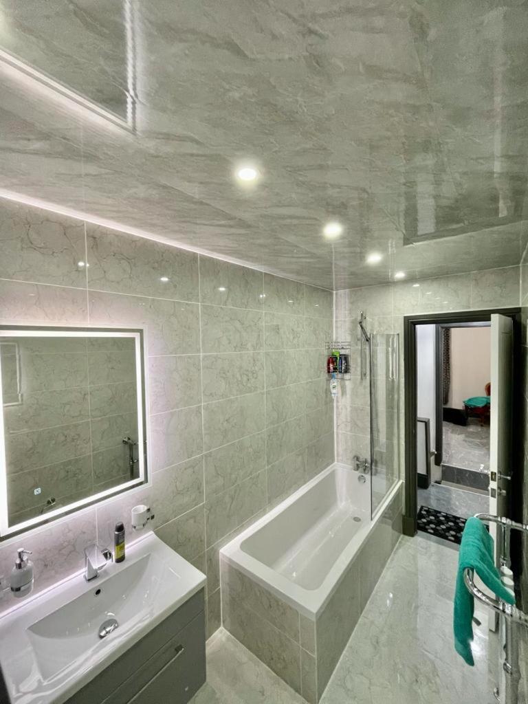 Three-Bedroom Apartment - Photo 13