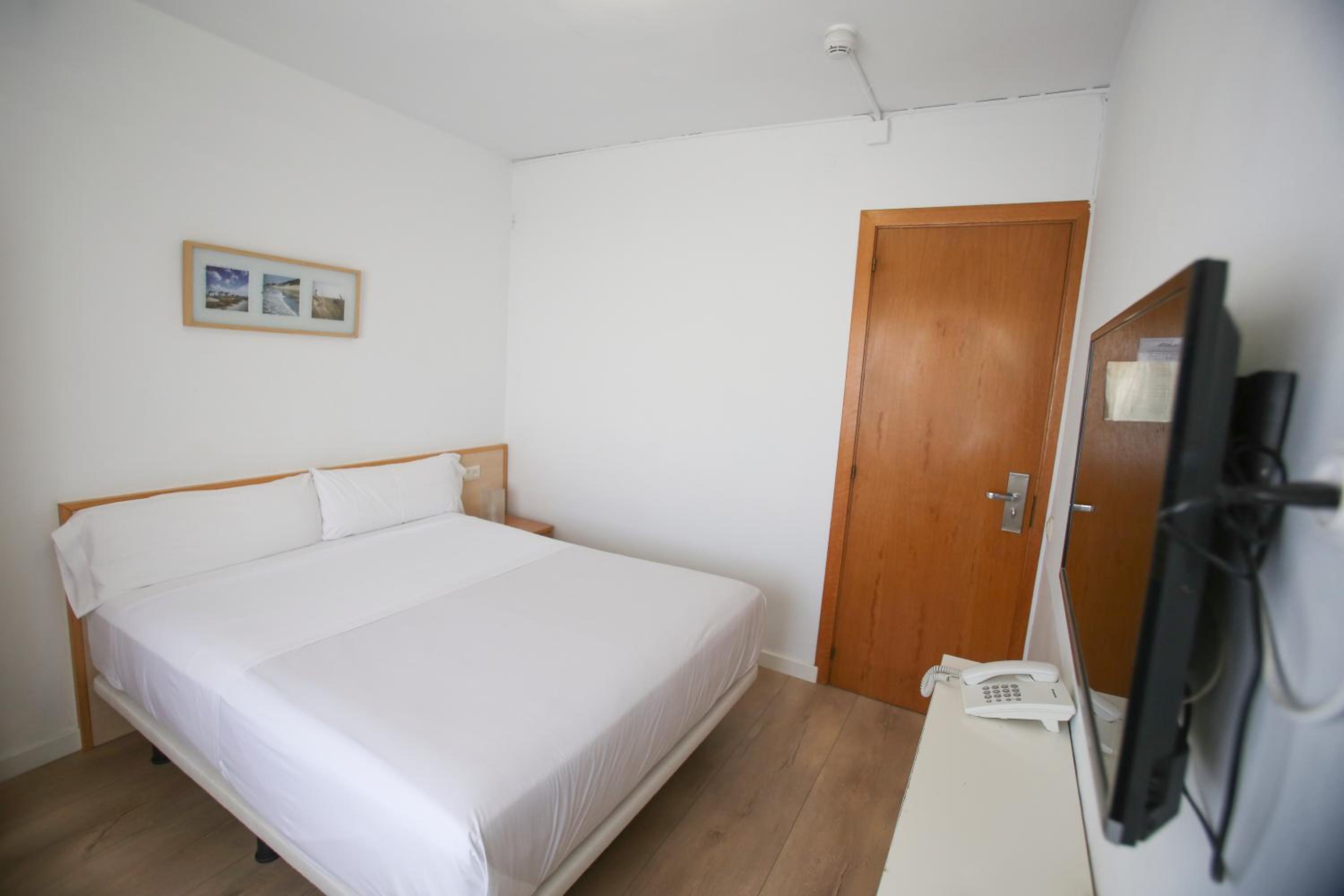 Habitación Doble Estándar o con Dos Camas Individuales.