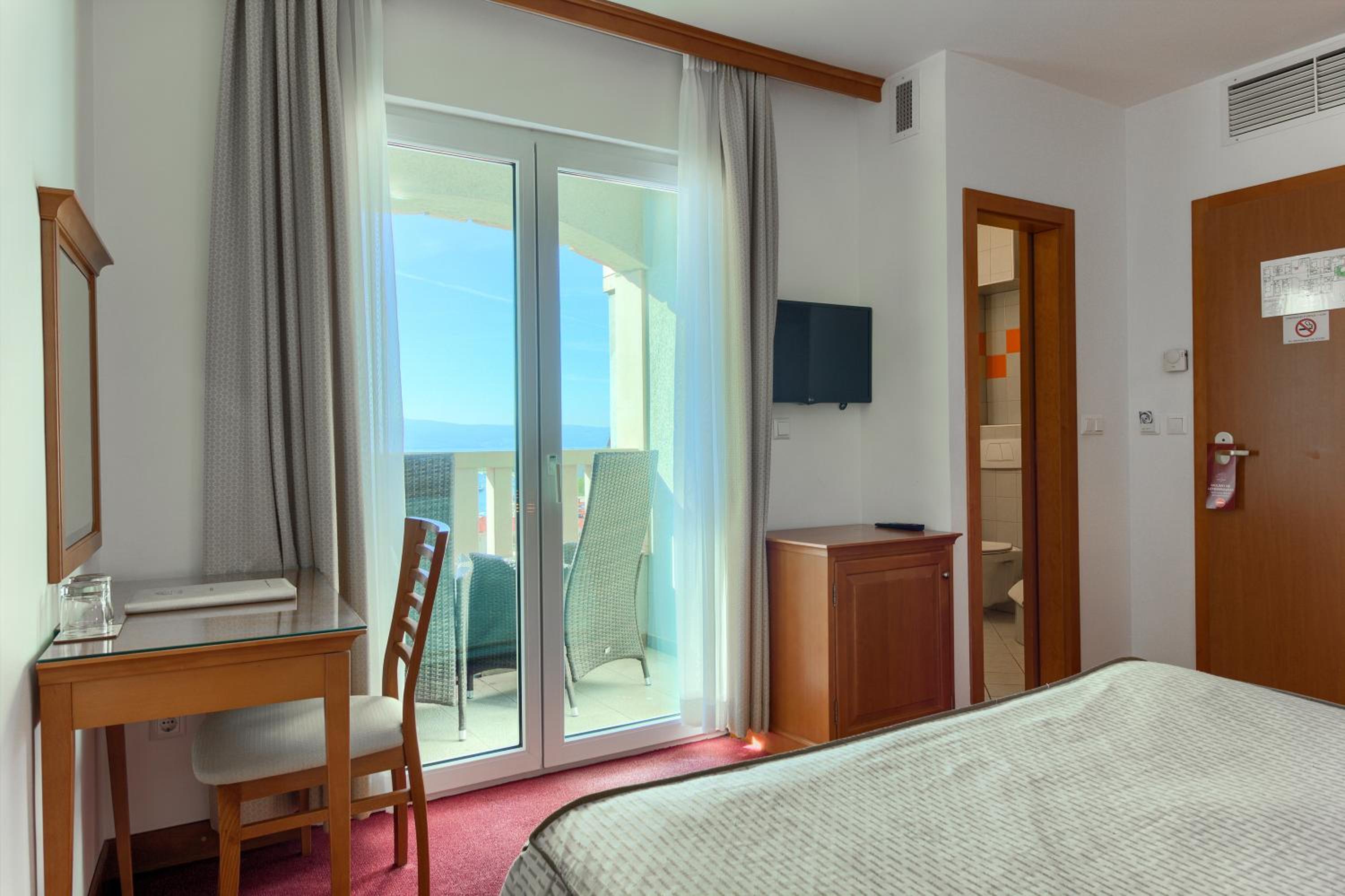 Quarto Duplo com Varanda e Vista para o Mar