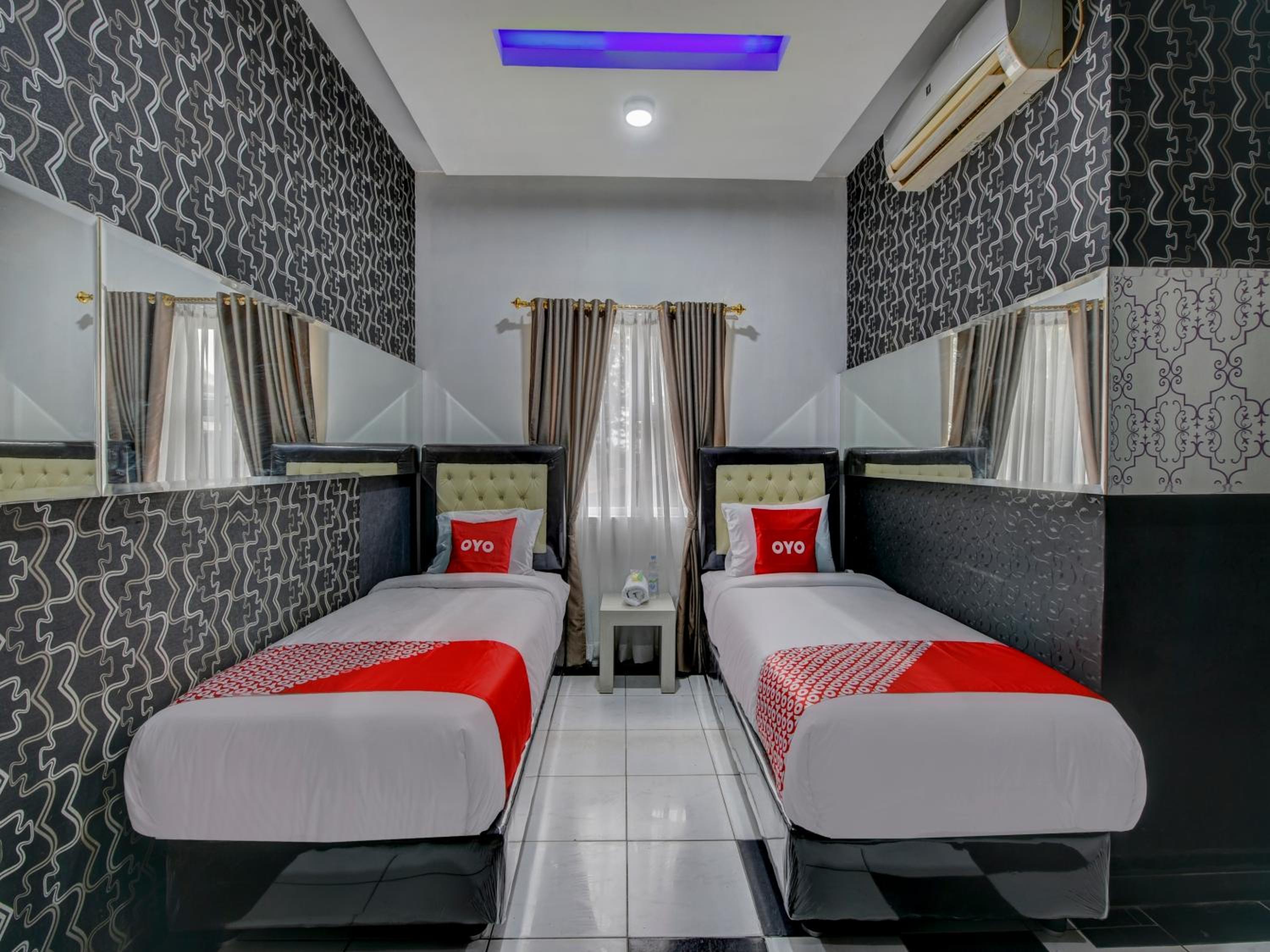 Delxue Twin Room - Photo 1