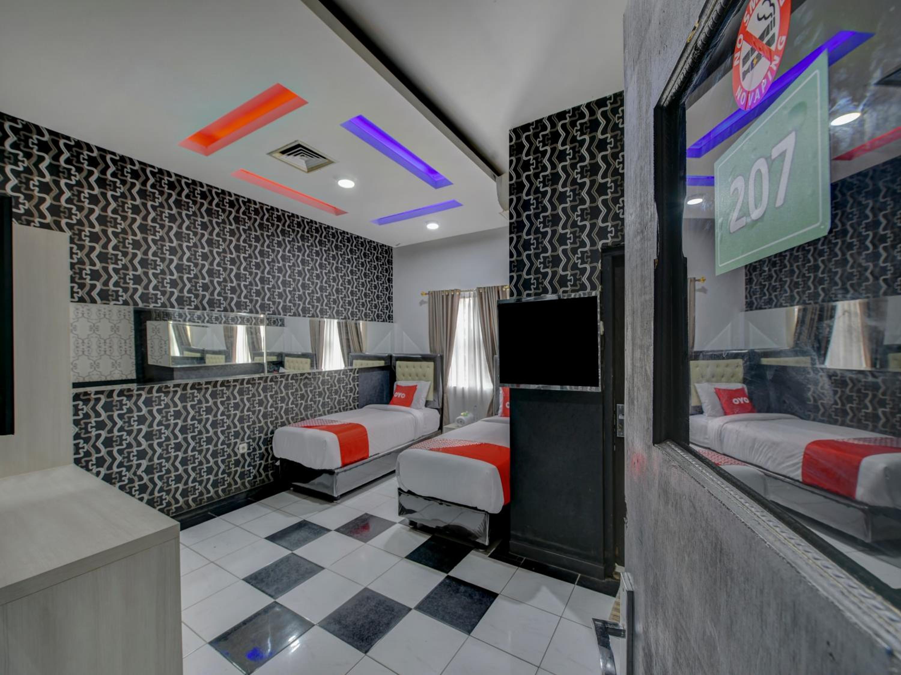 Delxue Twin Room - Photo 7