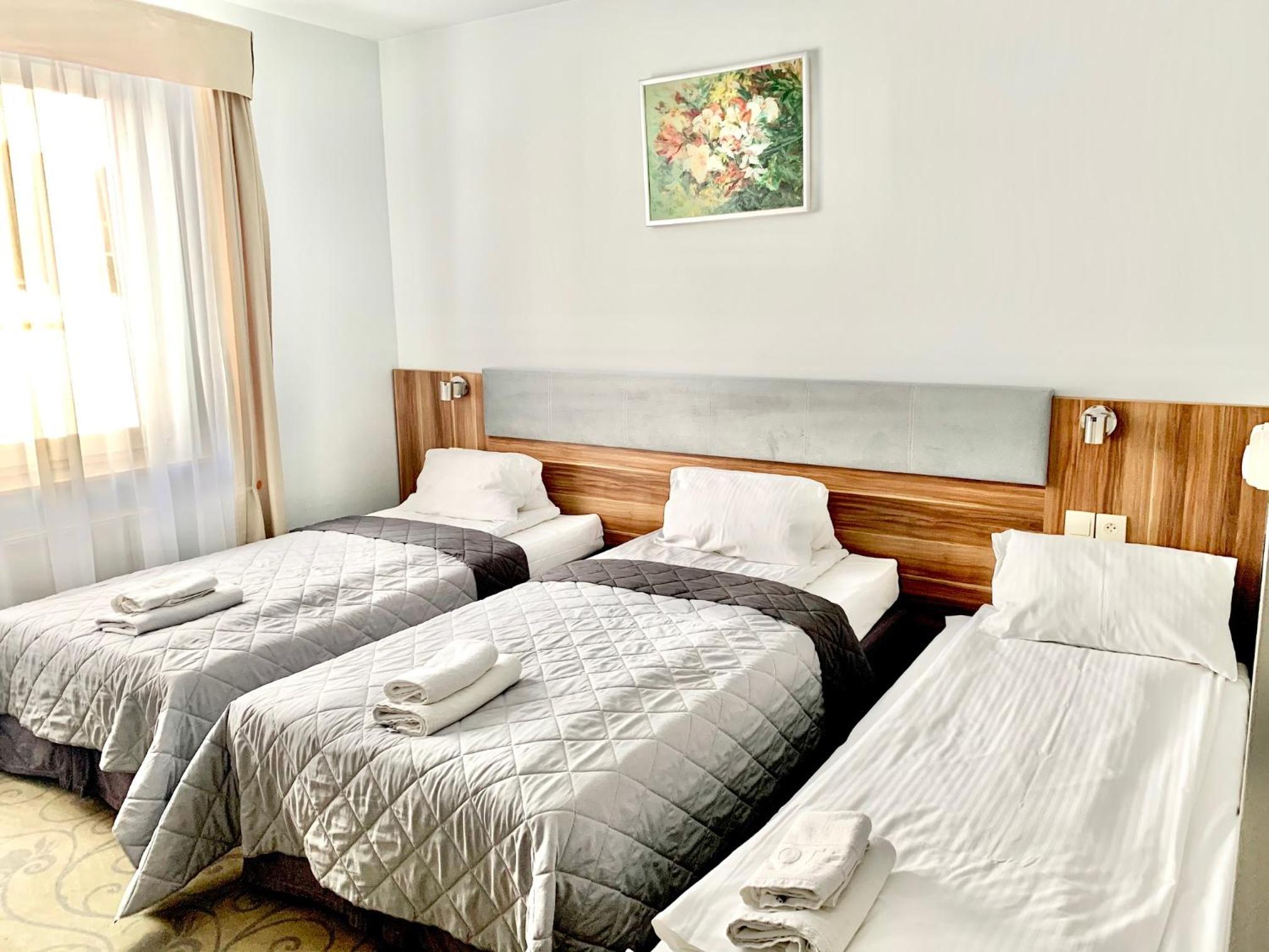 Triple Room - Photo 1