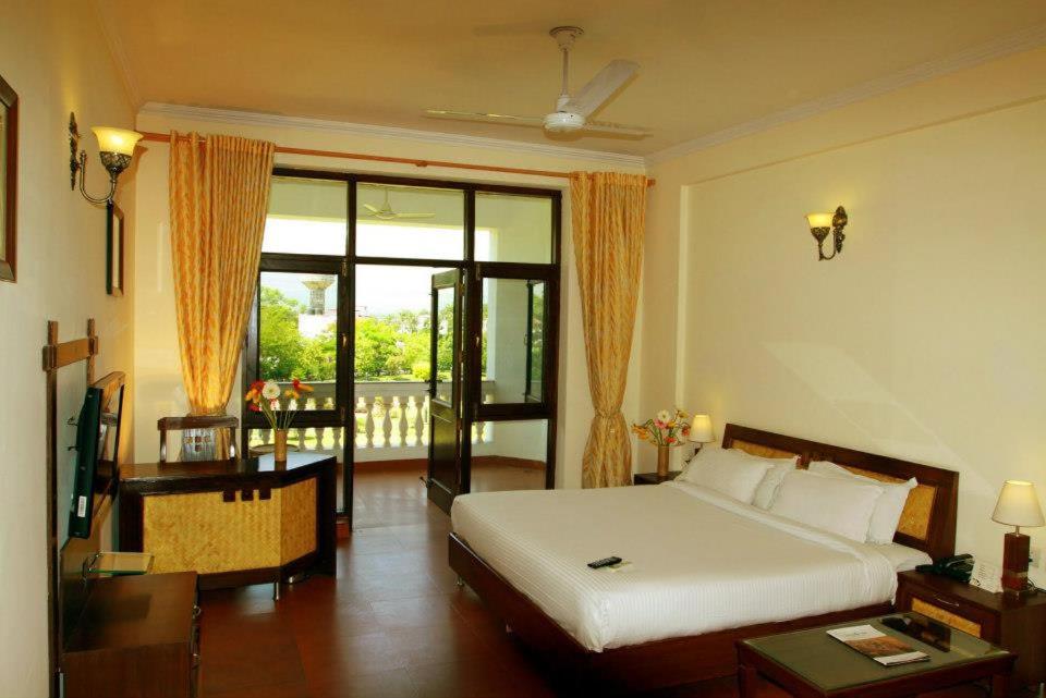 Deluxe Room with Garden view Balcony - Photo 2