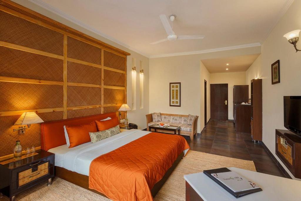 Deluxe Room with Garden view Balcony - Photo 1