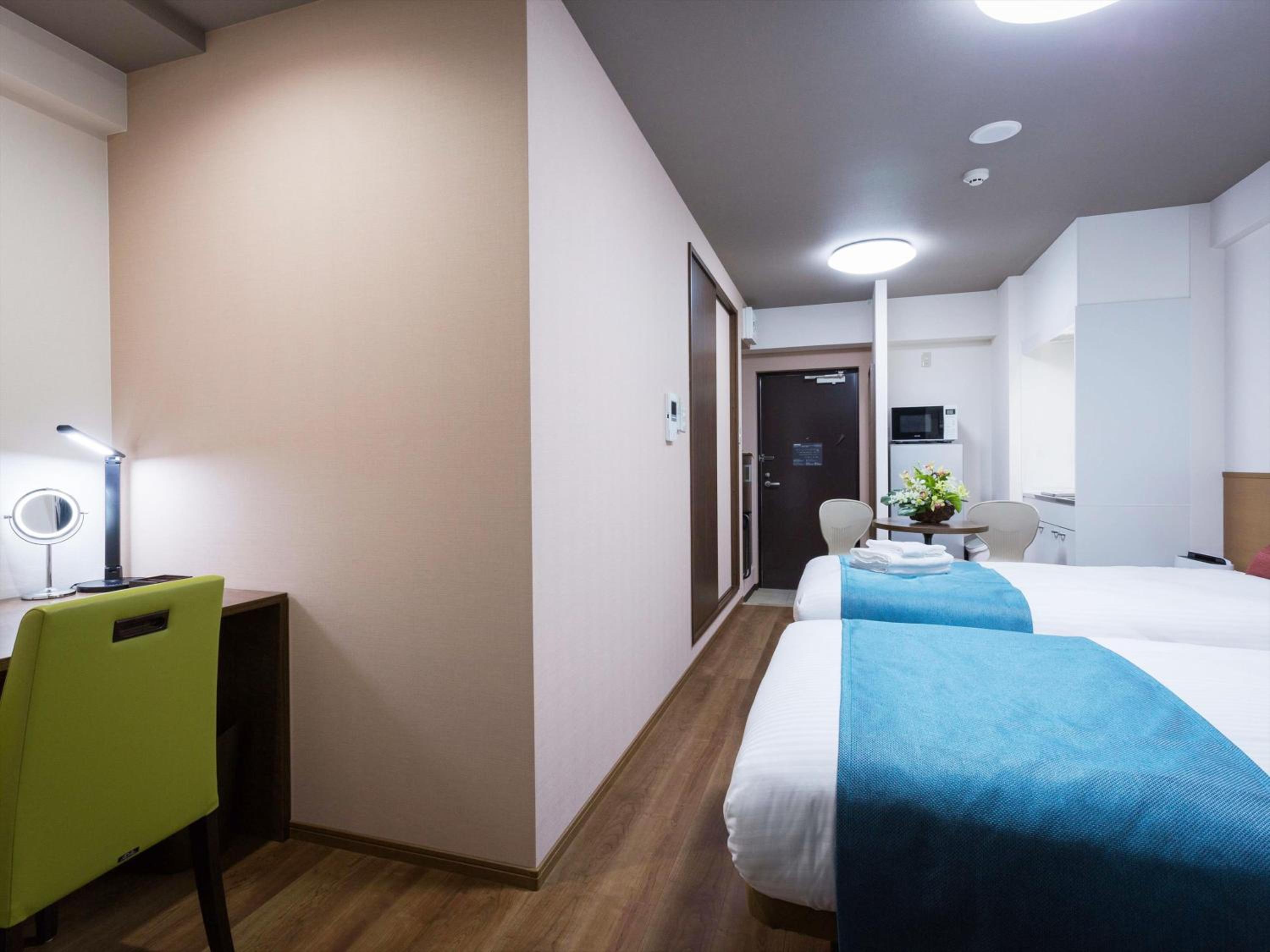 Standard Twin Room - Photo 16