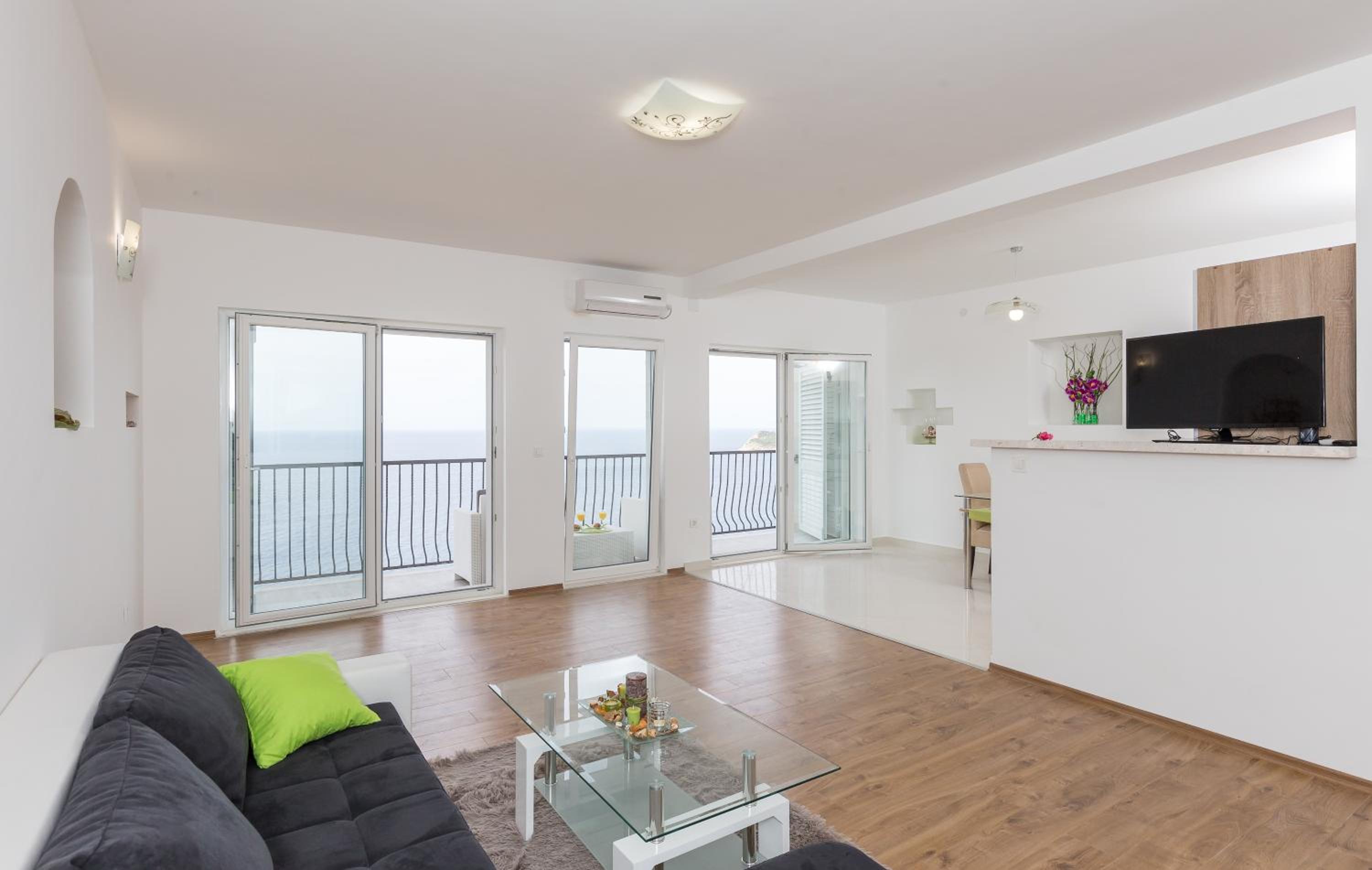 One-Bedroom Apartment with Balcony and Sea View