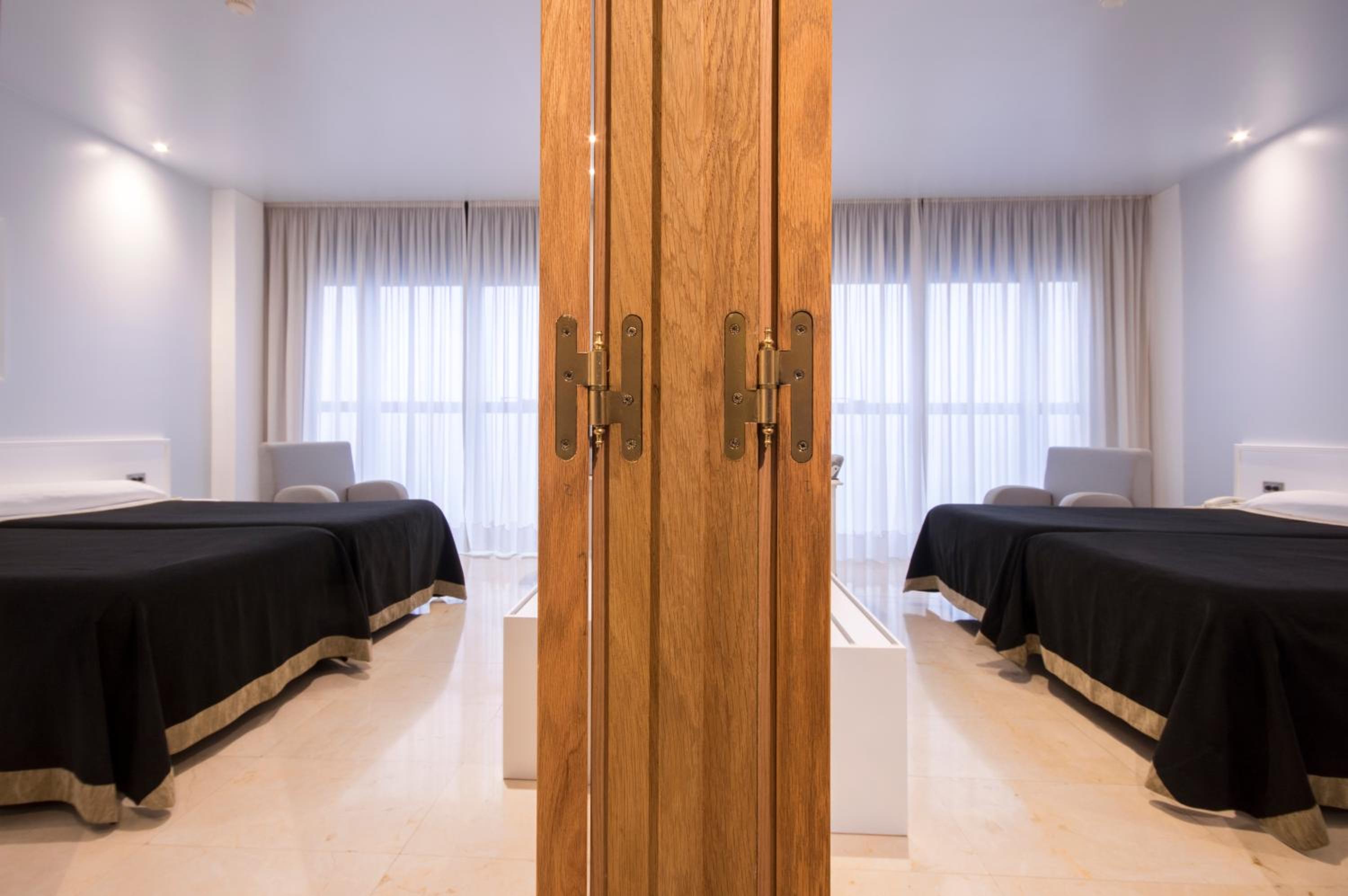 Habitación Cuádruple (2 Adultos + 2 Niños)