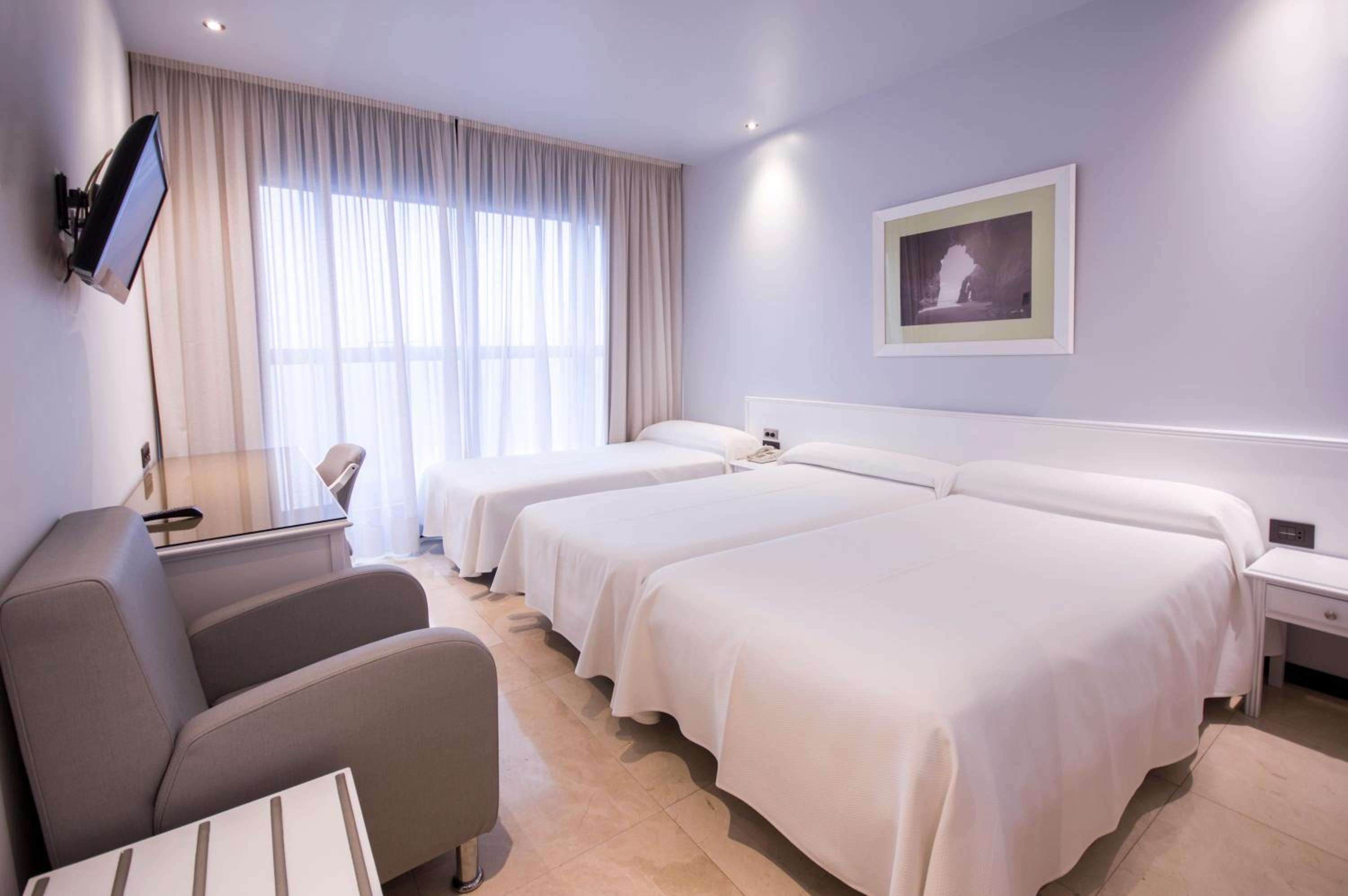 Habitación Doble o con Dos Camas con Cama Extra (2 Adultos + 1 Niño)