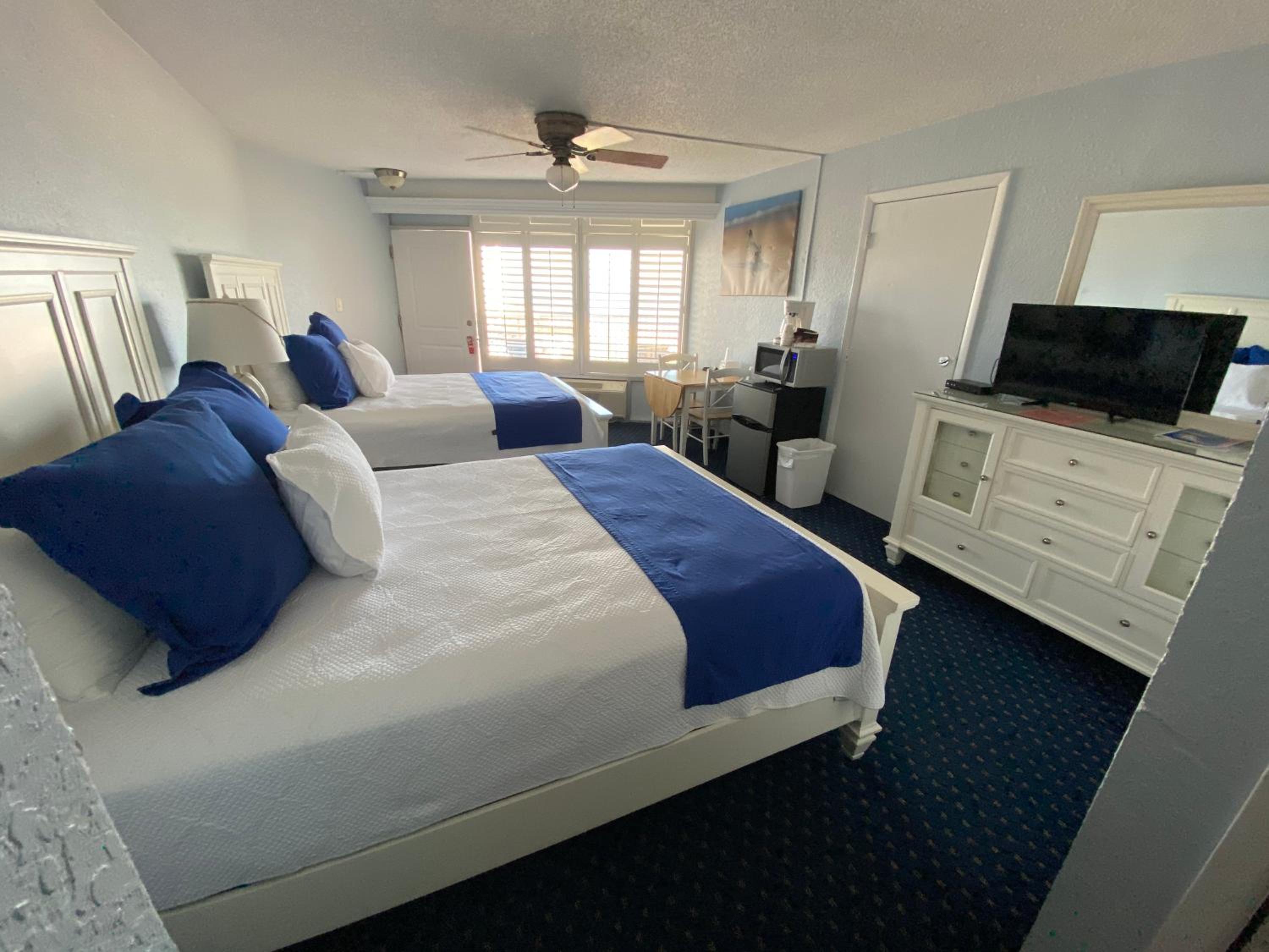 Standard Queen Room with Two Queen Beds - Photo 1
