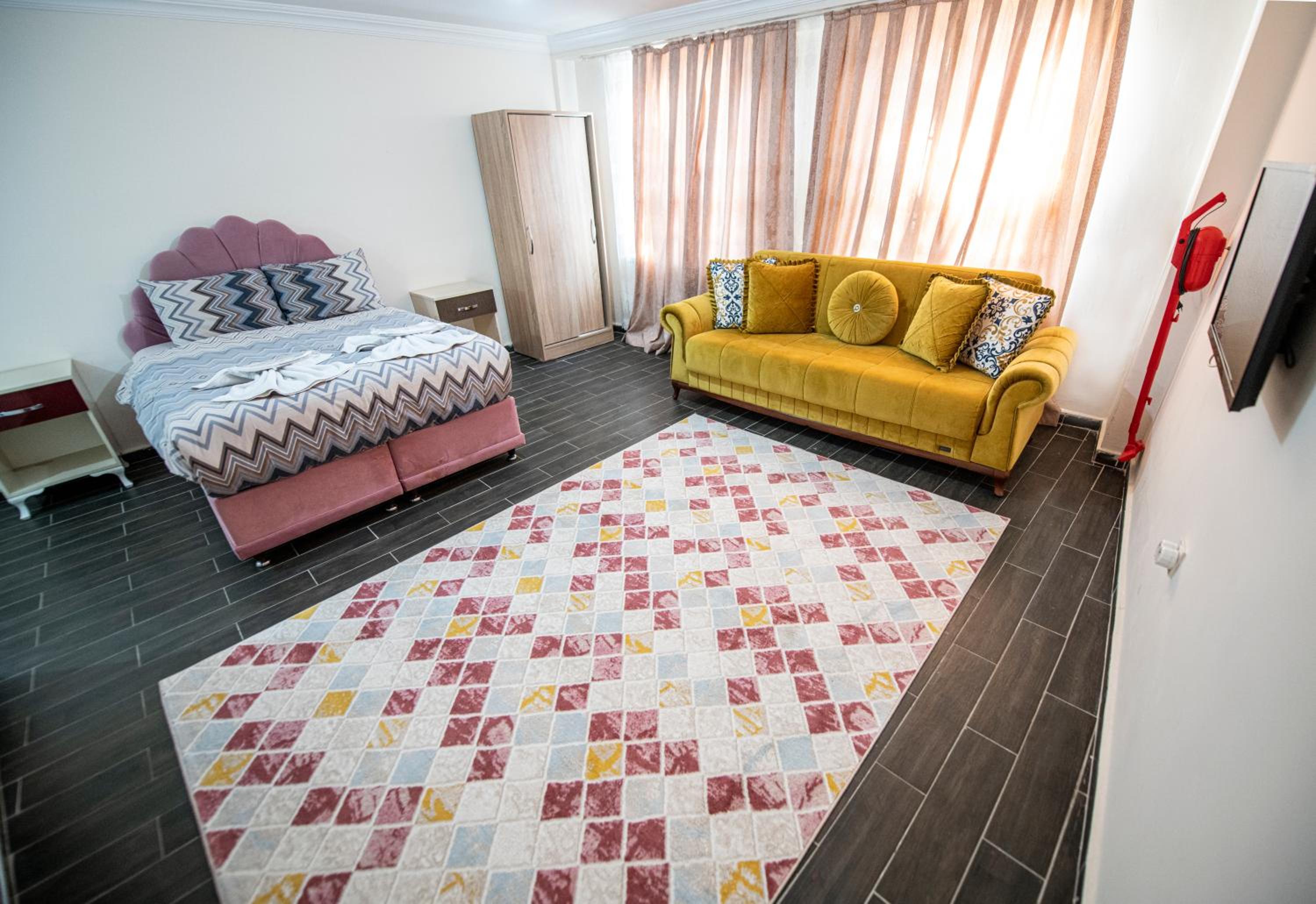 Deluxe Room (2 Adults + 1 Child) photo 3